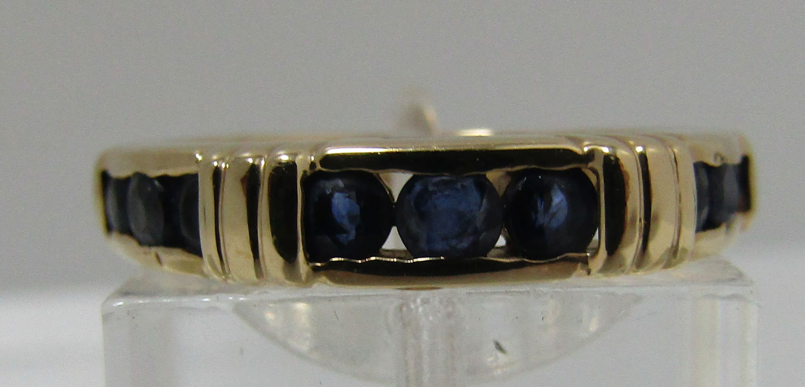 14K GOLD 9 BLUE SAPPHIRE BAND RING SIZE 7 (1 of 7)