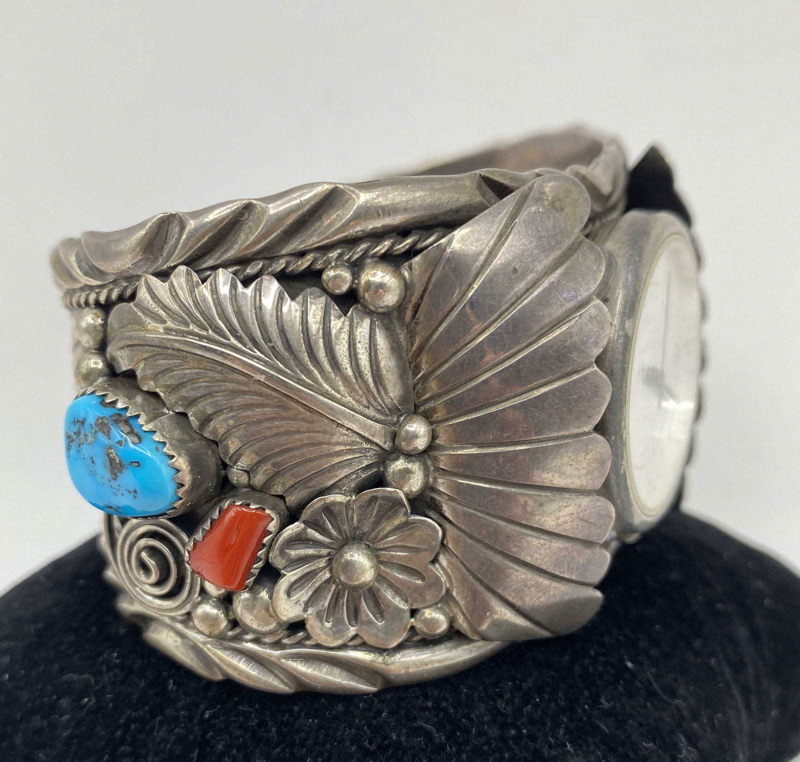 108 GRAM STERLING NAVAJO CORAL TURQUOISE BRACELET: NATIVE AMERICAN NAVAJO HANDMADE WATCH CUFF BRACELET. SIGNED MARKED "A" FOR ANNIE CHAPO. TESTED STERLING SILVER. WEIGHS 108 GRAMS. MEASURES 1.75" TALL. GAP IS 1.25" AND FITS 7.25" WRIST TOTAL. USA SHIP