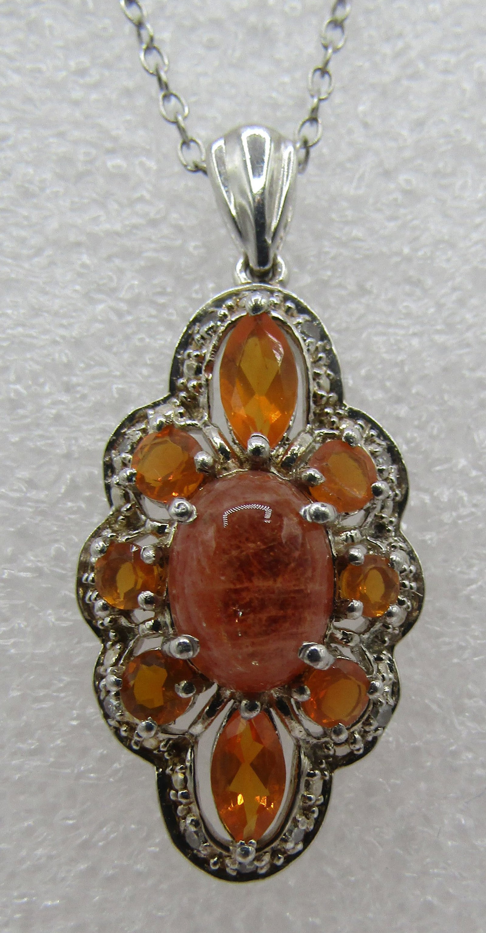MEXICAN FIRE OPAL CLUSTER NECKLACE STERLING SILVER: VINTAGE ESTATE MEASURES 18 INCHES LONG PLUS A 1" CLUSTER PENDANT DROP. WEIGHS 3.6 GRAMS. EXCELLENT USED CONDITION. USA SHIPPING $5. NO INTERNATIONAL SHIPPING.