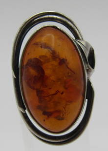 HALLMARK BALTIC FOSSIL AMBER RING STERLING SILVER: HALLMARKED VINTAGE ESTATE BALTIC AMBER RING MEASURES 34MM BY 21MM WIDE. WEIGHS 10.0 GRAMS. SIZE 6 1/2. EXCELLENT USED CONDITION. USA SHIPPING $5. NO INTERNATIONAL SHIPPING.