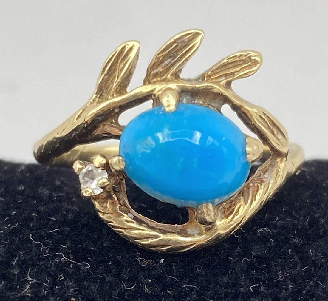 10K SOLID GOLD DIAMOND TURQUOISE LEAF RING: SIGNED "10K" TESTED 10K SOLID GOLD. 2 CARAT CABOCHON TURQUOISE STONE IN UNIQUE EYE-SHAPED TREE BRANCHES. WEIGHS 3.2 GRAMS. 15MM ACROSS. RING SIZE 6.5. USA SHIPPING $5. NO INTERNATIONAL SHIPPING