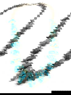 105 GRAM STERLING NAVAJO TURQUOISE BEADED NECKLACE: HANDMADE NATIVE AMERICAN NAVAJO PEARL SEAM BEAD AND TURQUOISE STONE NECKLACE. GORGEOUS SPIDERWEB MATRIX ON THESE KINGMAN MINE TURQUOISE STONES. TESTED STERLING SILVER. WEIGHS 105 GRAMS. MEASURES