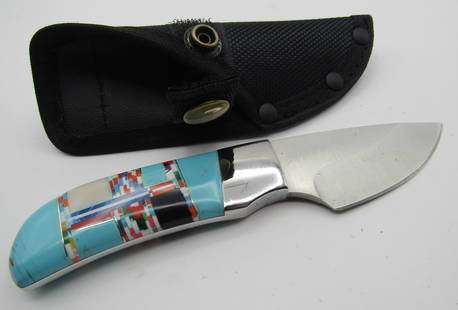 TURQUOISE SKINNER HUNTING KNIFE: SMALL HUNTING KNIFE 6 INCH KNIFE WITH 2 1/2 INCH BLADE. LIKE NEW CONDITION WITH SHEATH. USA SHIPPING $5 NO INTERNATIONAL.