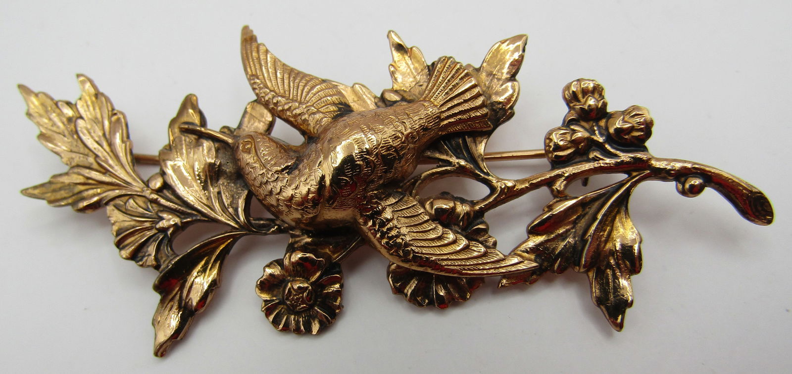 CIRCA 1940 CORO PIN GOLD ON STERLING SILVER BROOCH: MARKED "STERLING BY CORO" VINTAGE ESTATE MEASURES 3 INCHES BY 1 3/8 INCHES. WEIGHS 9.2 GRAMS. EXCELLENT USED CONDITION. USA SHIPPING $5. NO INTERNATIONAL SHIPPING.