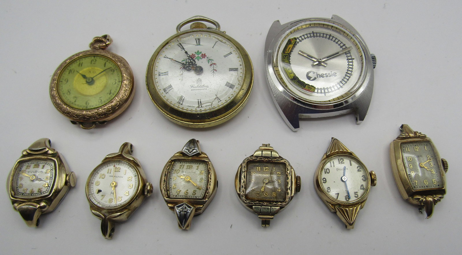 9 WRIST WATCH & POCKETWATCH COLLECTION LOT: 4 BULOVA, ELGIN, HAMILTON & CHESSIE (MOVING TRAIN) WRISTWATCHES; AO TRANSISTIONAL & FIELDSTONE POCKETWATCHES, AS FOUND. USA SHIPPING $5. NO INTERNATIONAL SHIPPING.