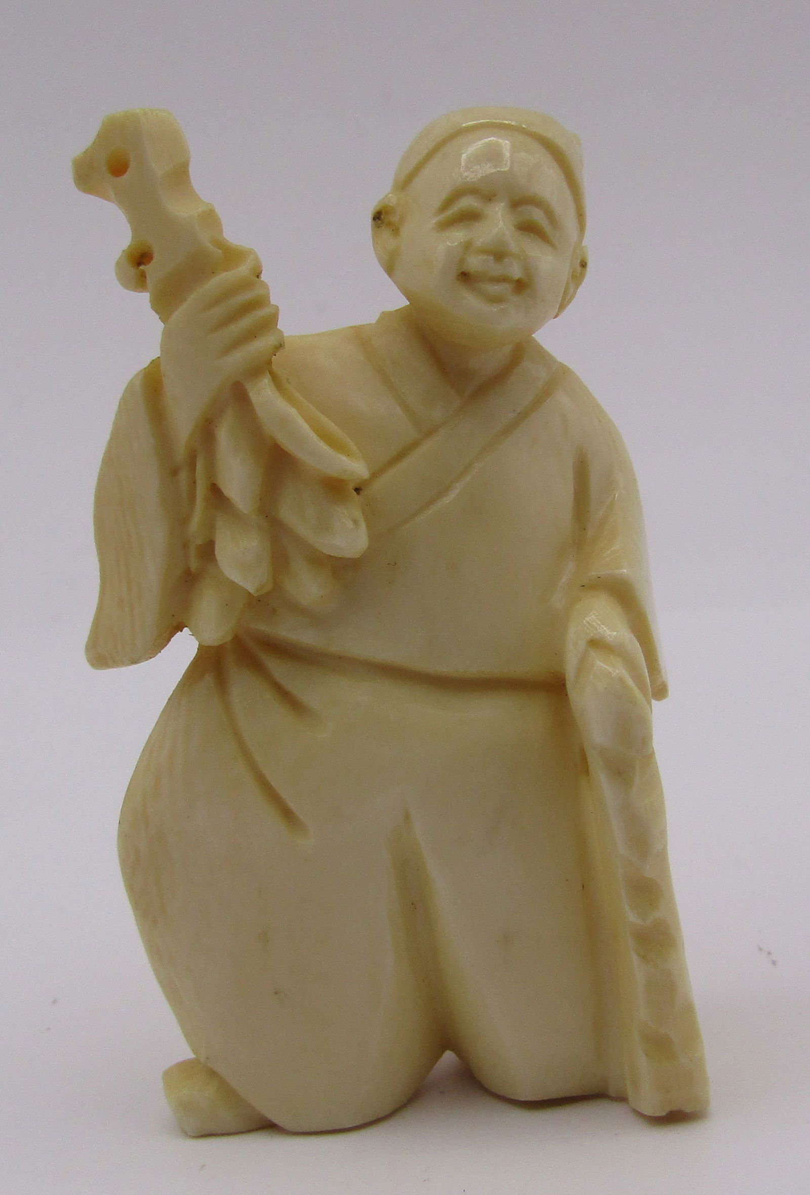 ARTIST SIGNED & CARVED NETSUKE OF AN ELDER (1 of 3)
