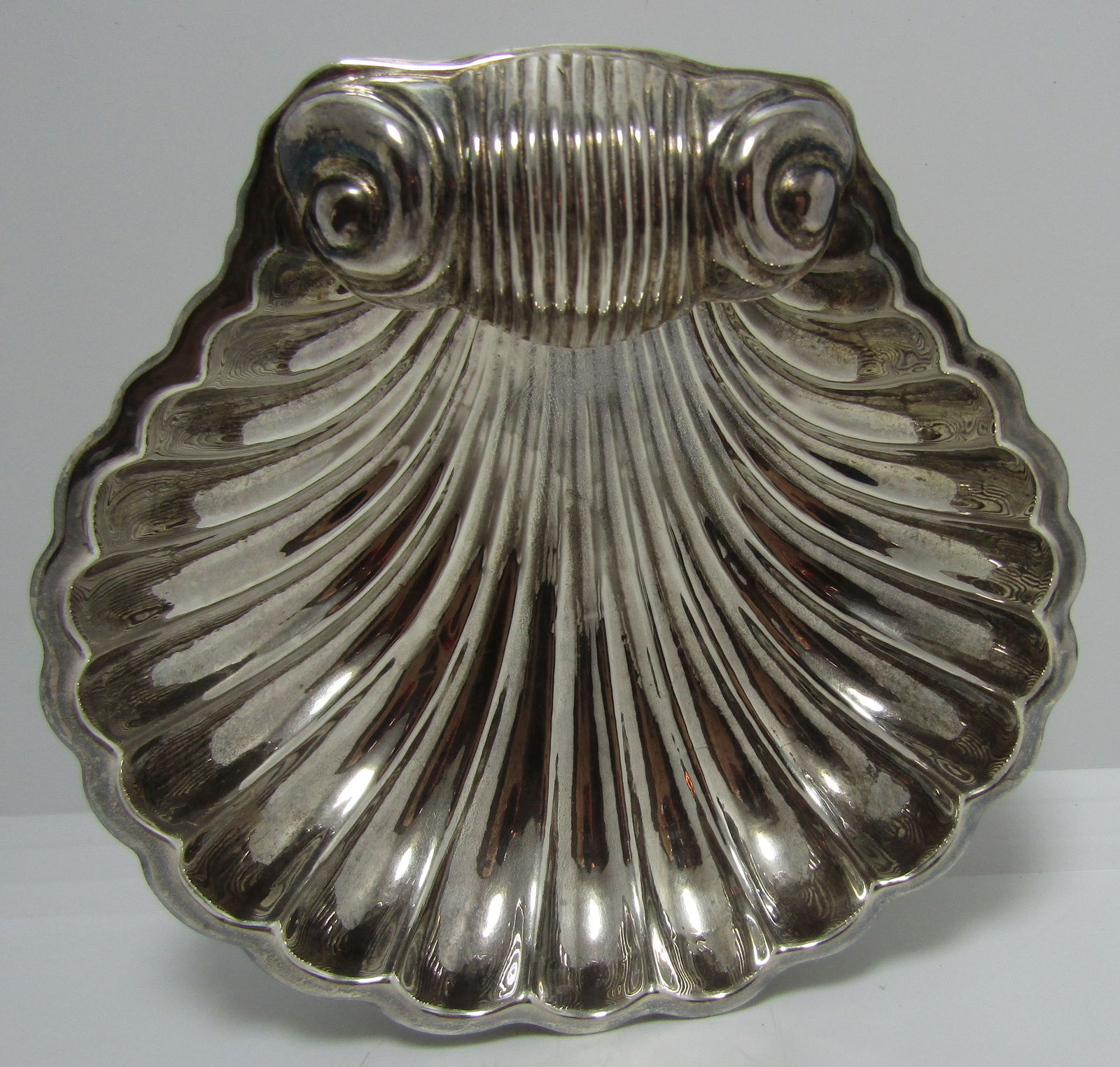 A Janna Thomas Sterling Silver Clam Shell.