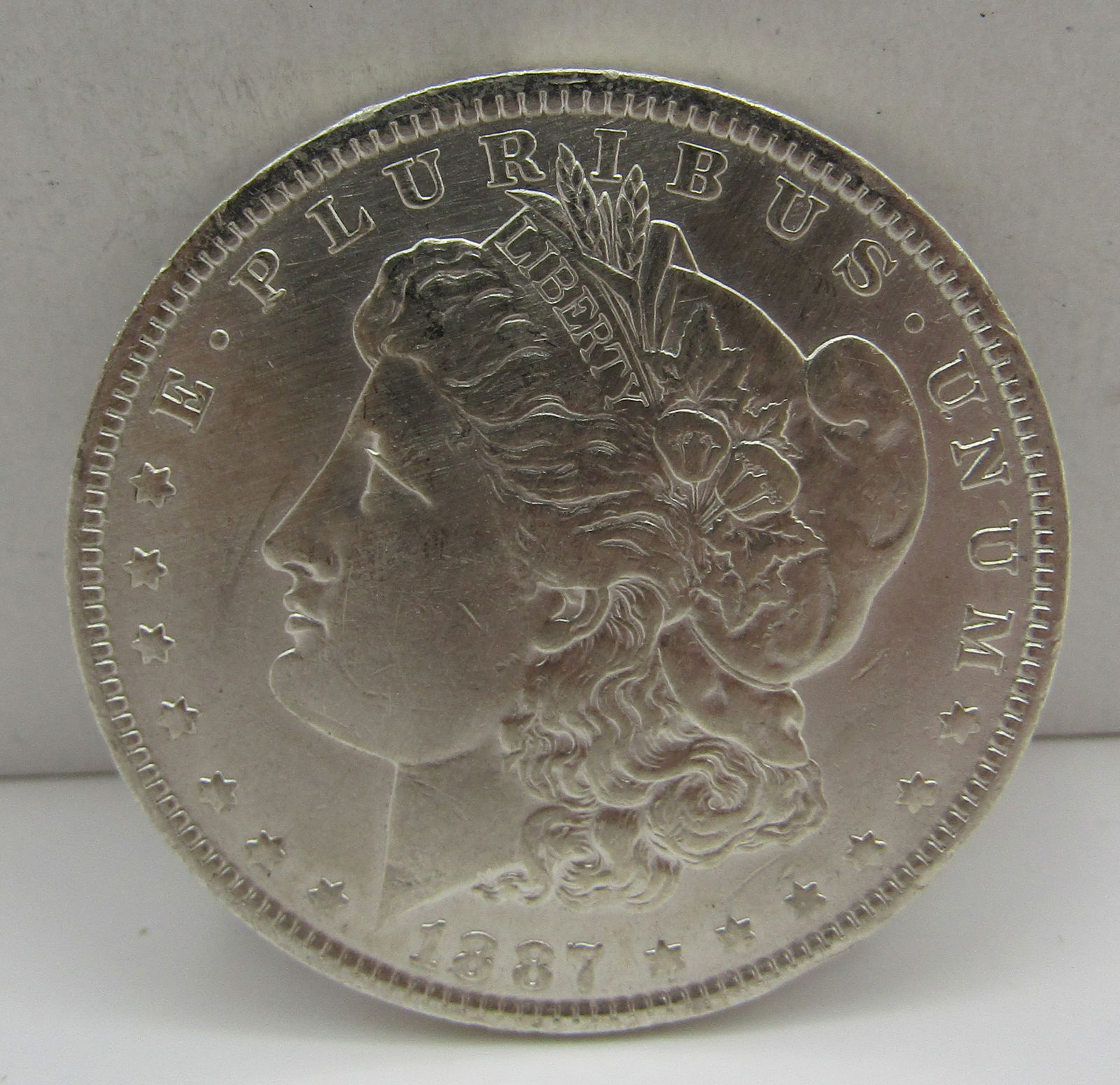 1887 O  U.S. MORGAN SILVER DOLLAR COIN (1 of 2)