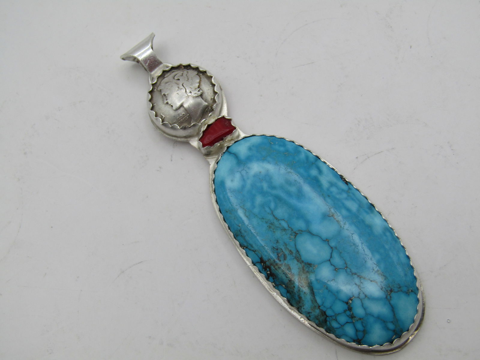 MICHAEL THOMAS KINGMAN WATERWEB TURQUOISE PENDANT (1 of 2)