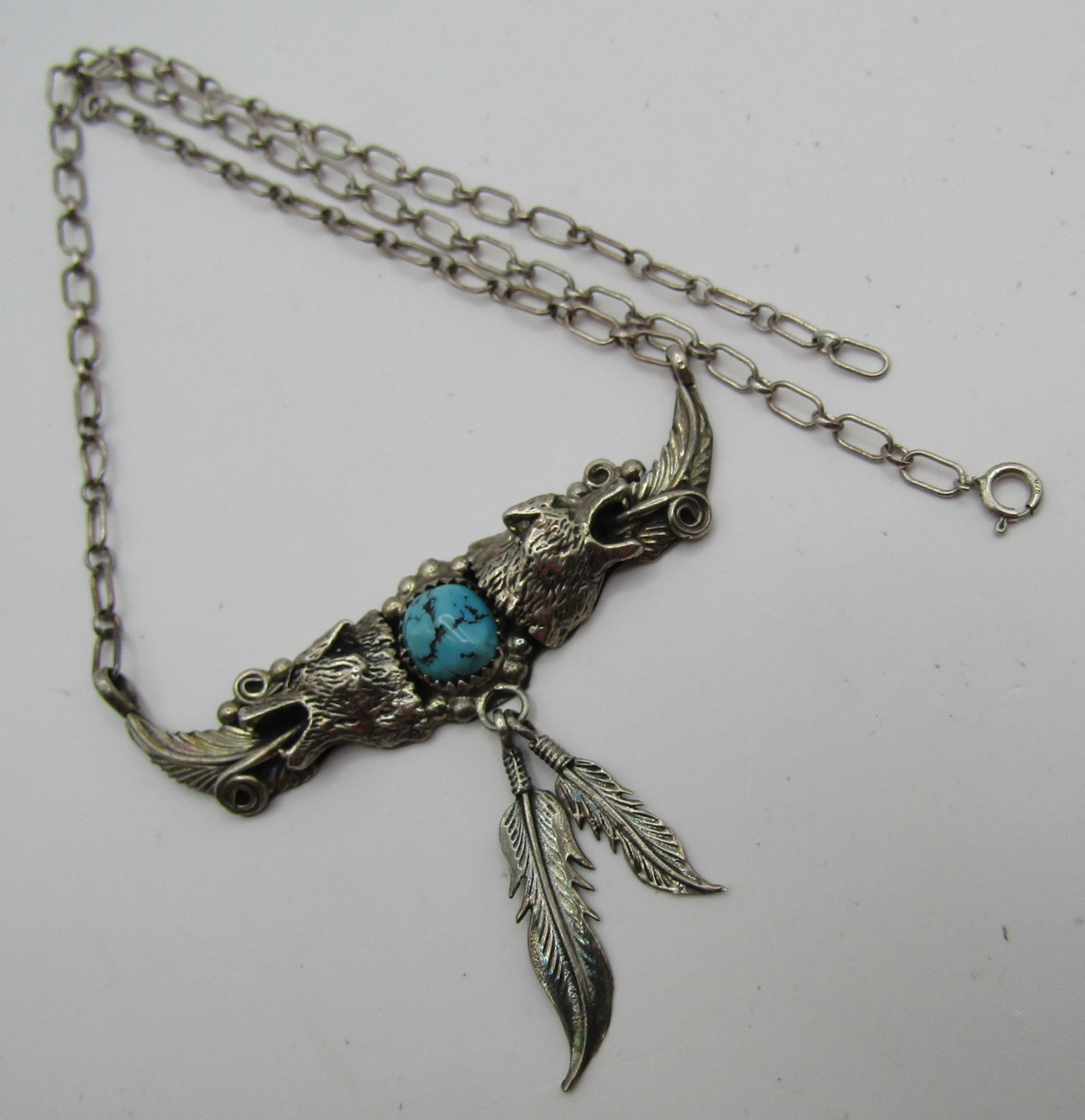 "RB" TURQUOISE COYOTE NECKLACE STERLING SILVER: VINTAGE ESTATE HALLMARKED "RB STERLING"; TESTED STERLING SILVER. NATIVE AMERICAN NAVAJO SOUTHWEST INDIAN JEWELRY. MEASURES 19 INCHES LONG WITH 2.5" CENTER. WEIGHS 15.8 GRAMS. EXCELLENT USED CONDITION.