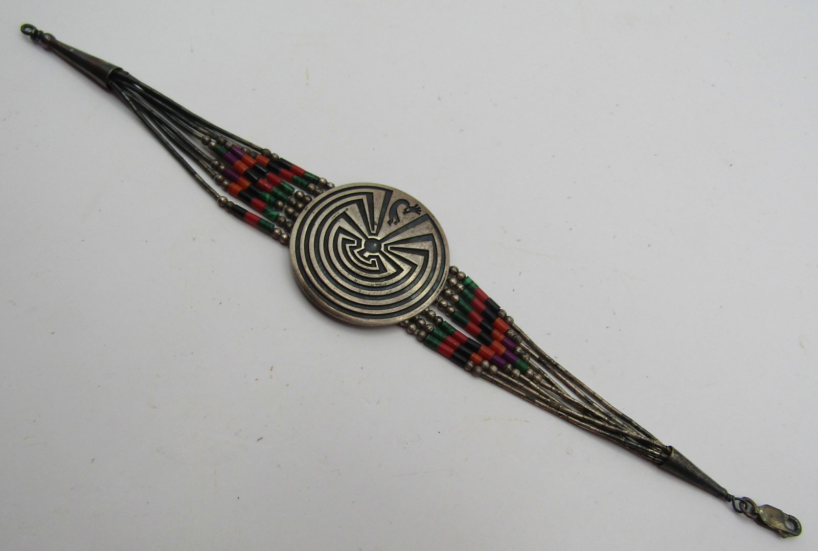 KABANA MAN IN THE MAZE BRACELET STERLING SILVER: VINTAGE ESTATE SIGNED "KBN STER" 7.25 INCHES LONG MAN IN THE MAZE DESIGN. MADE IN ALBUQUERQUE NM. WEIGHS 12.4 GRAMS. EXCELLENT USED CONDITION. USA SHIPPING $5