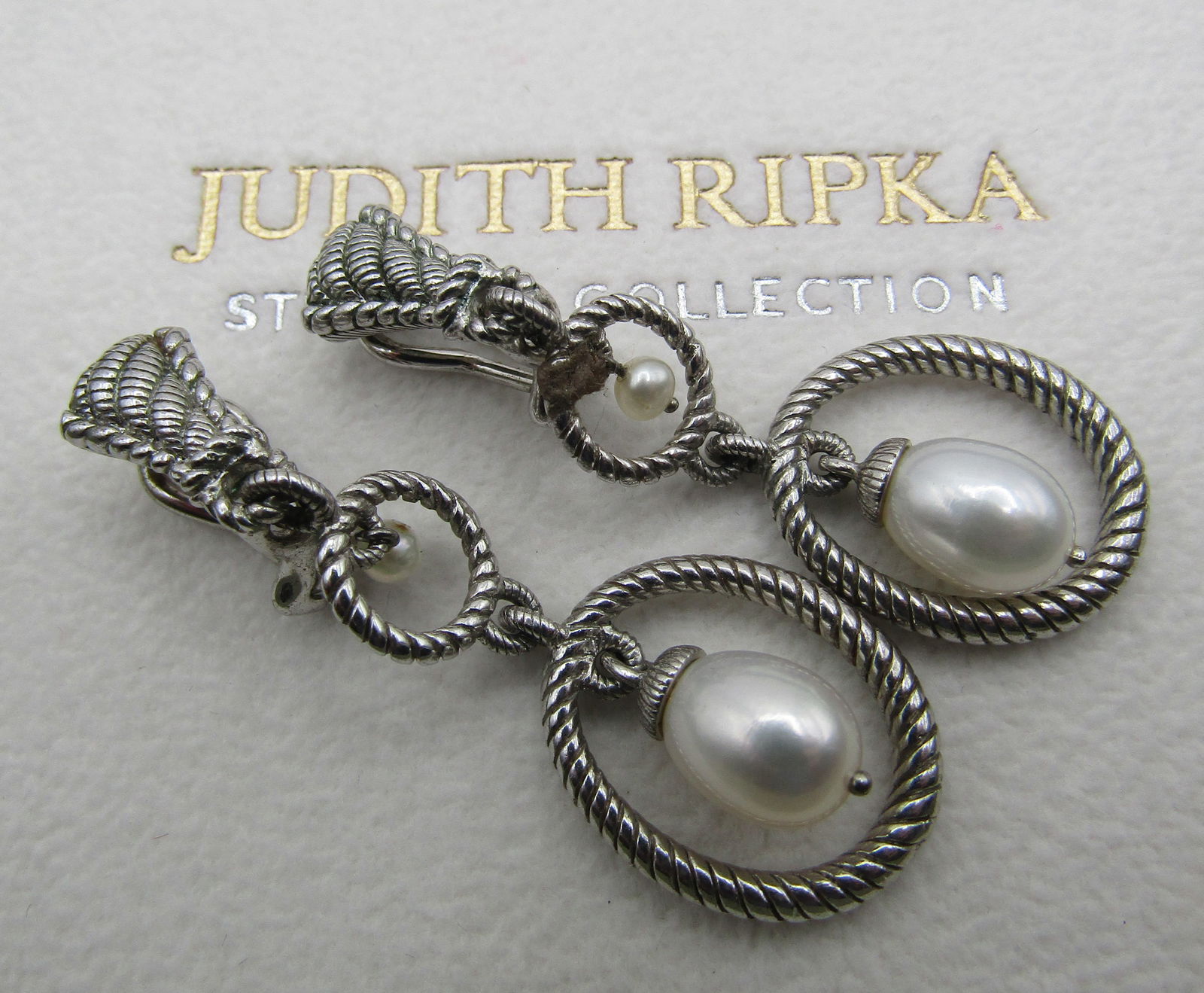 JUDITH RIPKA PEARL EARRINGS STERLING SILVER: AUTHENTIC SIGNED "JUDITH RIPKA 925": MEASURE 2" BY 5/8". WEIGH 11.0 GRAMS. EXCELLENT LIKE NEW, NEVER USED CONDITION. USA SHIPPING $5.
