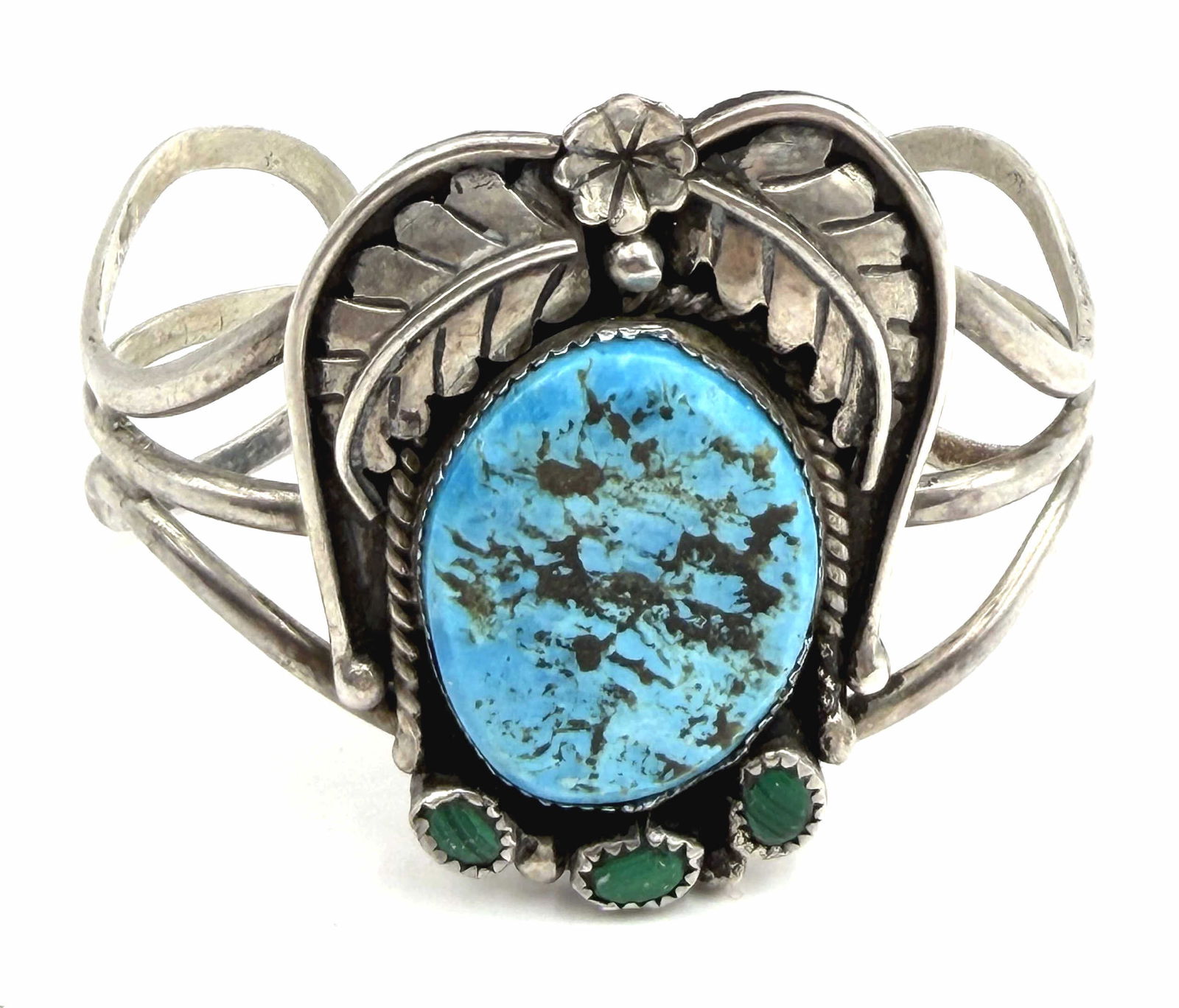 STERLING TURQUOISE MALACHITE NAVAJO BRACELET: NATIVE AMERICAN HANDMADE CUFF BRACELET. UNSIGNED UNMARKED TESTED STERLING SILVER. FACE MEASURES 2" TALL. GAP IS 1.5" FLEXIBLE AND FITS 7" WRIST. WEIGHS 40.9 GRAMS. USA SHIPPING $5.