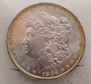 UNCIRCULATED 1904 NEW ORLEANS SILVER DOLLAR (1 of 2)