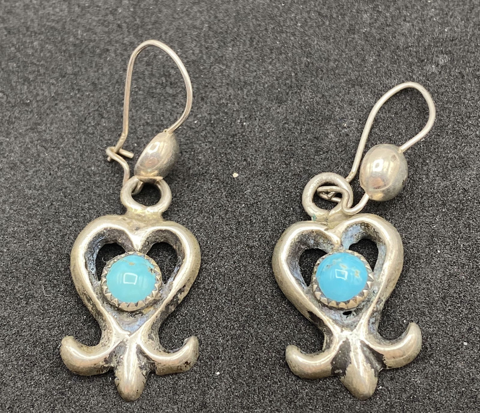 TUFA CAST "MT" NAVAJO STERLING TURQUOISE EARRINGS: VINTAGE NATIVE AMERICAN HANDMADE EARRINGS TUFA SAND CAST. SIGNED "MT" LIKELY MELVIN OR MICHAEL THOMPSON. TESTED STERLING SILVER. MEASURES 1" WITHOUT DROP. WEIGHS 6.7 GRAMS TOTAL. USA SHIPPING $5.