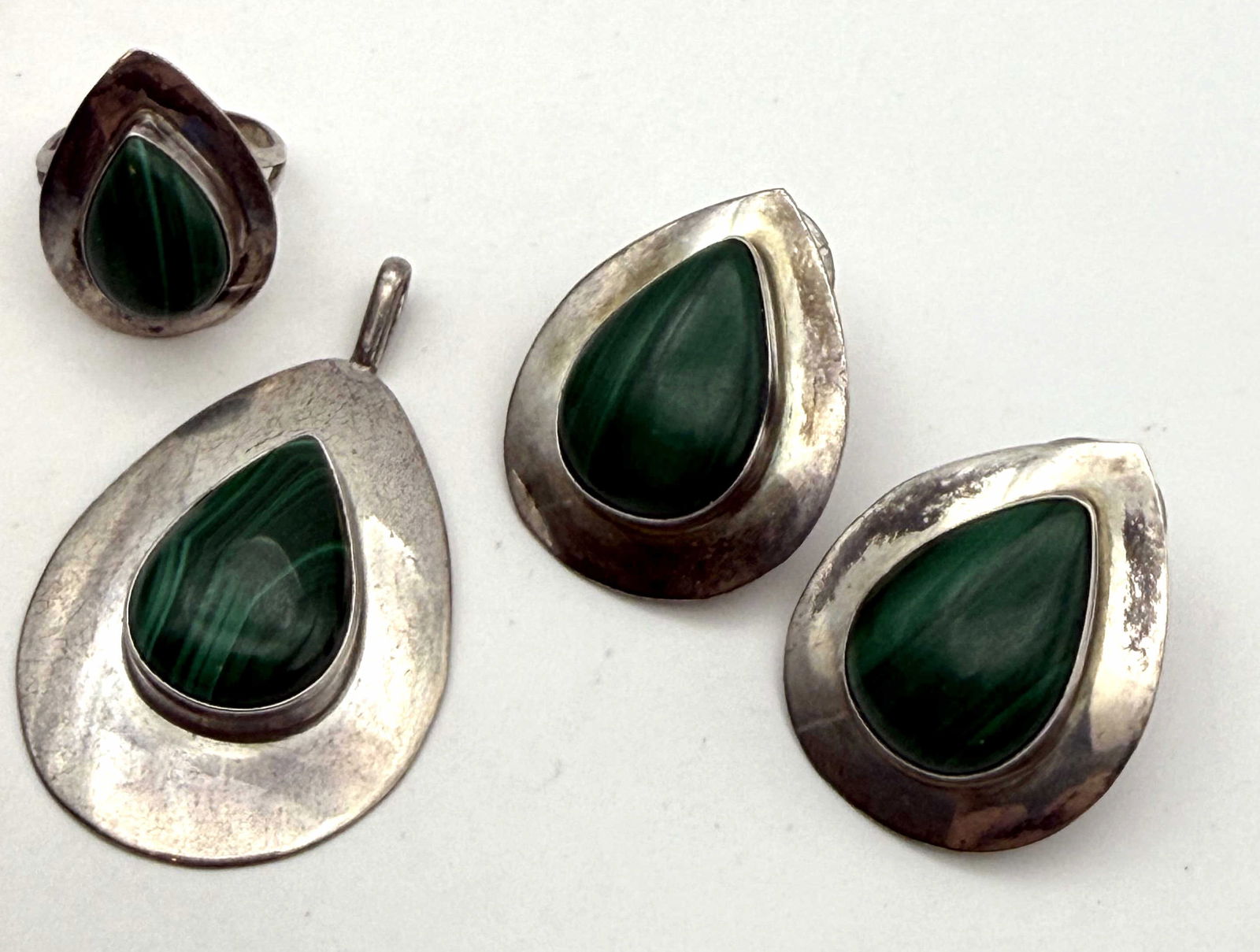 STERLING MALACHITE PENDANT RING EARRINGS SUITE: NATIVE AMERICAN HANDMADE MATCHING SUITE. MARKED SIGNED "O" TESTED STERLING SILVER. TOTAL WEIGHT 27.6 GRAMS. EARRINGS 1-1/4" PENDANT IS 1-7/8". RING SIZE 5.5. USA SHIPPING $5.