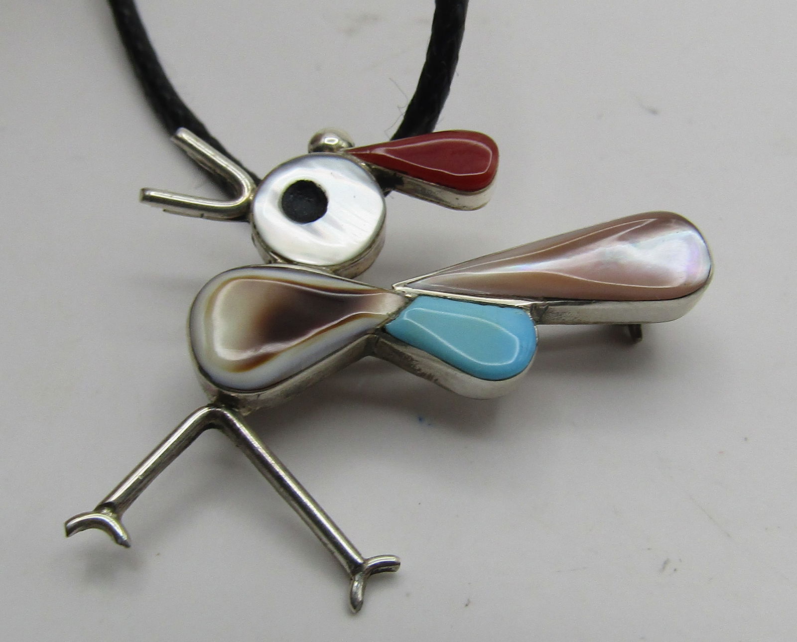 "CE" ZUNI NECKLACE PENDANT & PIN STERLING SILVER: INLAID BROOCH AND PENDANT WITH TURQUOISE, MOP, CORAL, ABALONE ONYX. ARTIST MARKED "CE ZUNI" TESTED STERLING INLAY BIRD. NATIVE AMERICAN SOUTHWEST INDIAN JEWELRY. LINK CHAIN MEASURES 20 INCHES LONG; PE