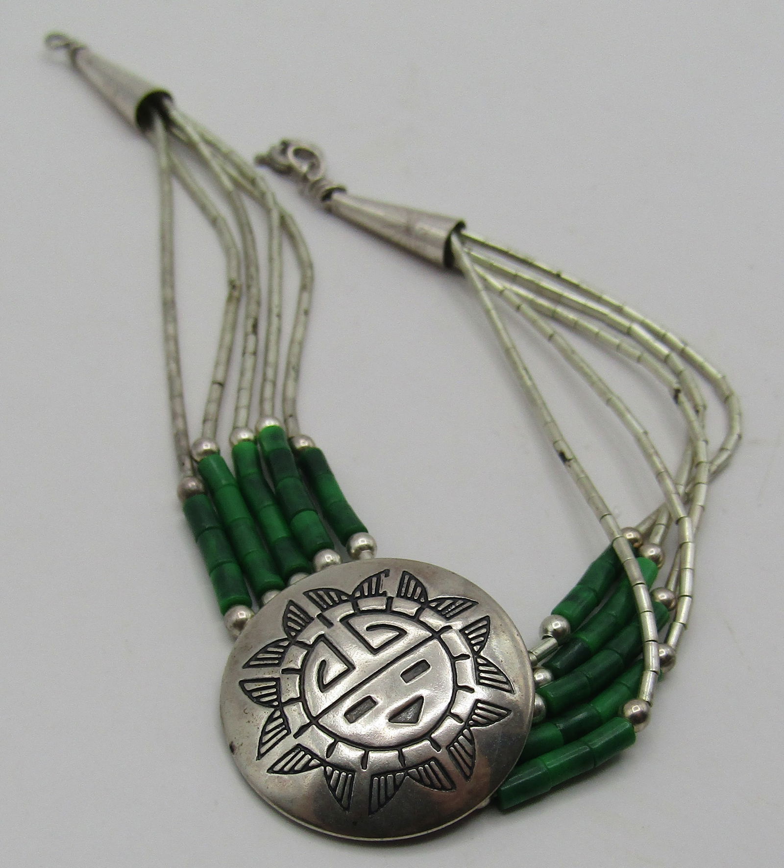 MALACHITE SUNFACE BRACELET STERLING SILVER: VINTAGE ESTATE MARKED "STERLING". NATIVE AMERICAN SOUTHWEST NAVAJO INDIAN JEWELRY. MEASURES 7 INCHES. WEIGHS 5.7 GRAMS.. EXCELLENT CONDITION. USA SHIPPING $5