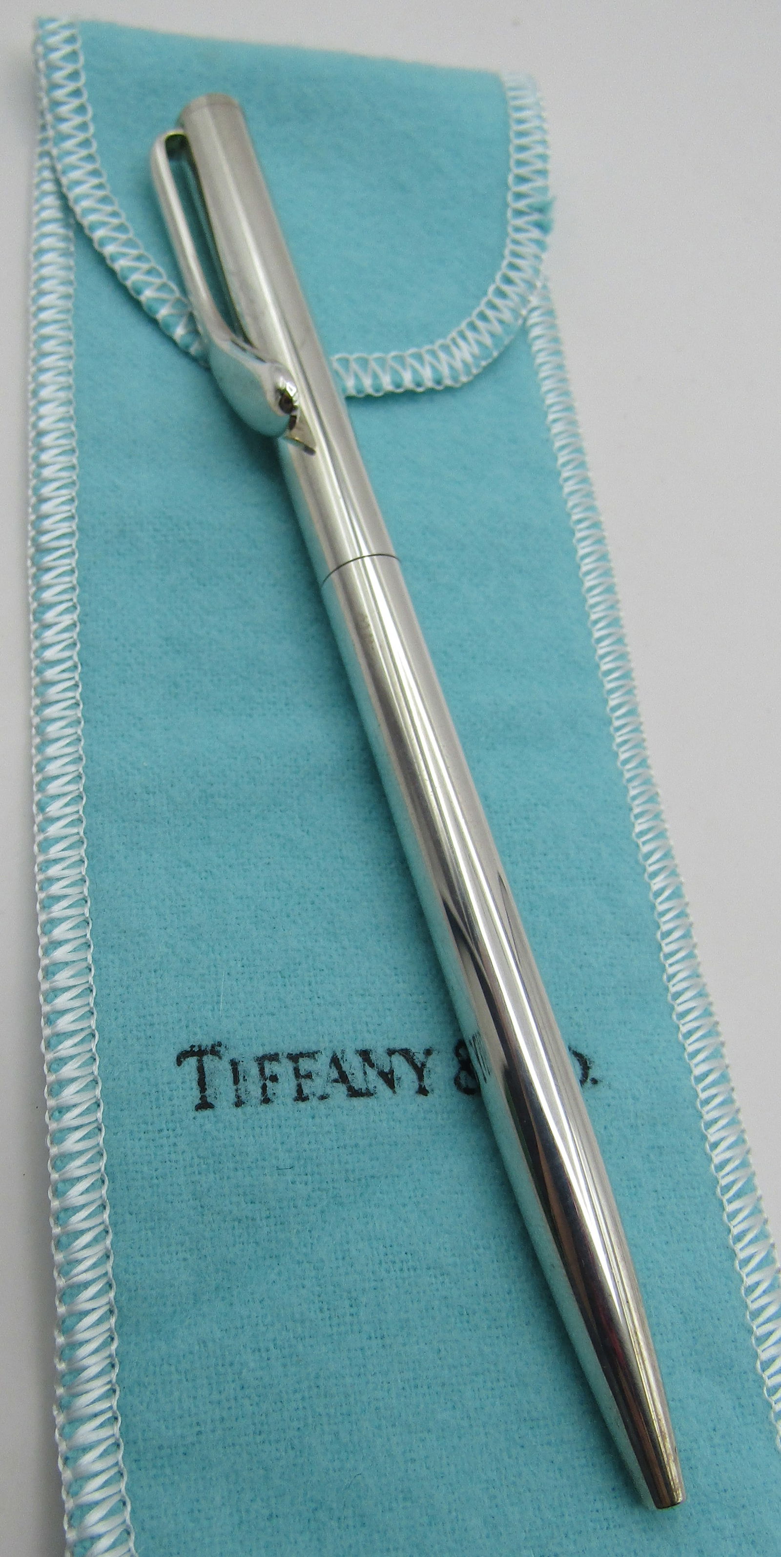 TIFFANY & CO ELSA PERETTI PEN STERLING SILVER: GENUINE SIGNED "TIFFANY & CO ELSA PERETTI AG 925" WITH A TIFFANY POUCH. MEASURES 5.25 INCHES LONG. EXCELLENT CONDITION. WEIGHS 21.3 GRAMS. BLACK INK. USA SHIPPING $5.