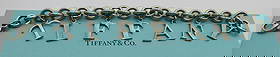 TIFFANY CHARM BRACELET STERLING SILVER: MEASURES 7.25 INCH LONG. WEIGHS 26.7 GRAMS OF STERLING SILVER. VINTAGE ESTATE EACELLENT USED CONDITION WITH A TIFFANY & CO BOX. USA SHIPPING $5.