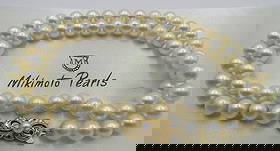 MIKIMOTO 7MM PEARL 18" NECKLACE 18K GOLD: GENUINE MIKIMOTO HALLMARKED "M 750" VINTAGE ESTATE 7MM GENUINE AKOYA CULTURED PEARLS KNOTTED WITH 18K YELLOW GOLD CATCH. WEIGHS 28.5 GRAMS. MEASURES 18 INCHES LONG. EXCELLENT CONDITION. USA SHIPPING $