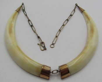 ANTIQUE MARKED 9CT GOLD WARTHOG TUSK NECKLACE