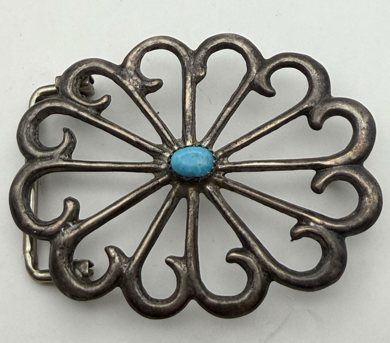 SANDCAST STERLING TURQUOISE CONCHO BELT BUCKLE: VINTAGE NATIVE AMERICAN HANDMADE BELT BUCKLE. UNMARKED UNSIGNED TESTED STERLING SILVER. MEASURES 2.5" X 2". WEIGHS 23.5 GRAMS. FITS 1.25" LEATHER. USA SHIPPING $5