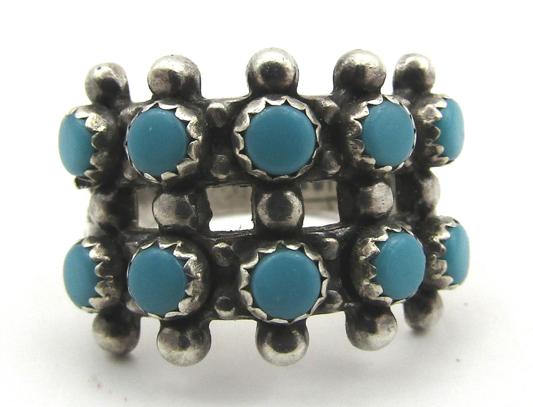 2 ROW SNAKE EYE TURQUOISE RING STERLING SILVER: VINTAGE ESTATE HALLMARKED AND "STERLING". NATIVE AMERICAN SOUTHWEST ZUNI / NAVAJO INDIAN JEWELRY. MEASURES 1/2 INCH WIDE. WEIGHS 4.2 GRAMS. SIZE 4 1/2. EXCELLENT USED CONDITION. WITH IMPERIAL AUCTION