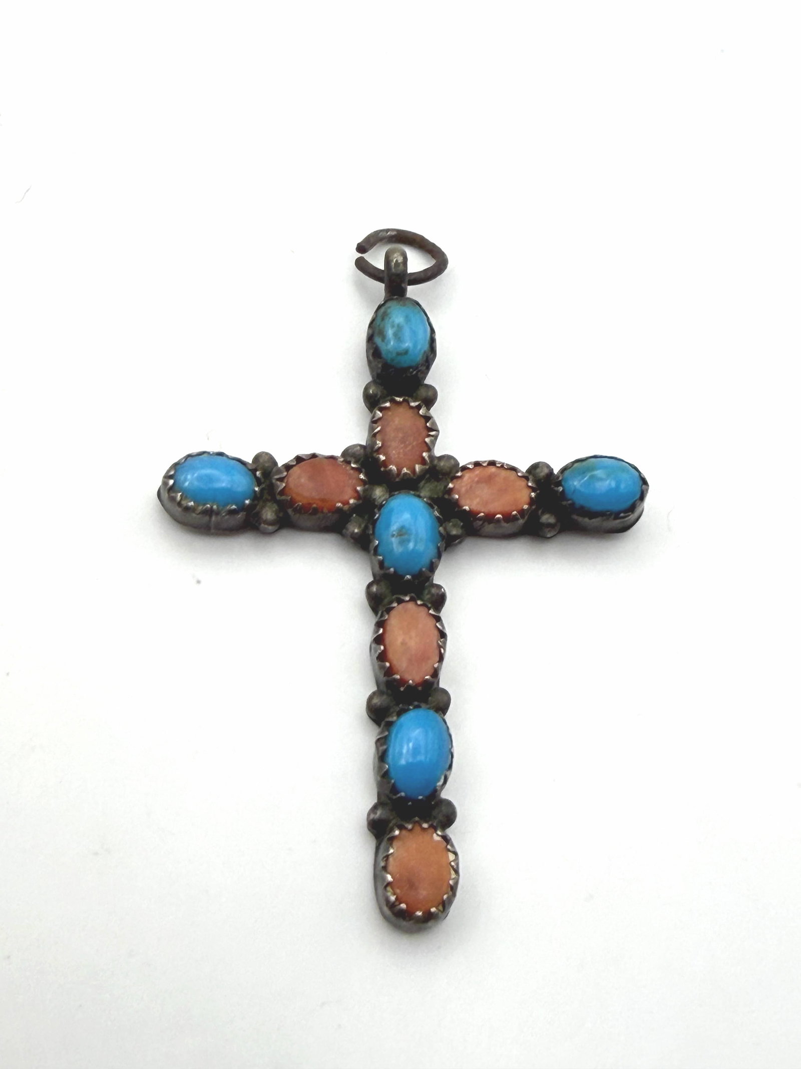 STERLING NAVAJO TURQUOISE SHELL CROSS PENDANT: VINTAGE HANDMADE NATIVE AMERICAN CROSS PENDANT WITH ORANGE SPINY OYSTER SHELL AND TURQUOISE STONES. UNSIGNED MARKED TESTED STERLING SILVER. WEIGHS 5.2 GRAMS. MEASURES 2" X 1-3/8". WITH IMPERIAL AUCTIO