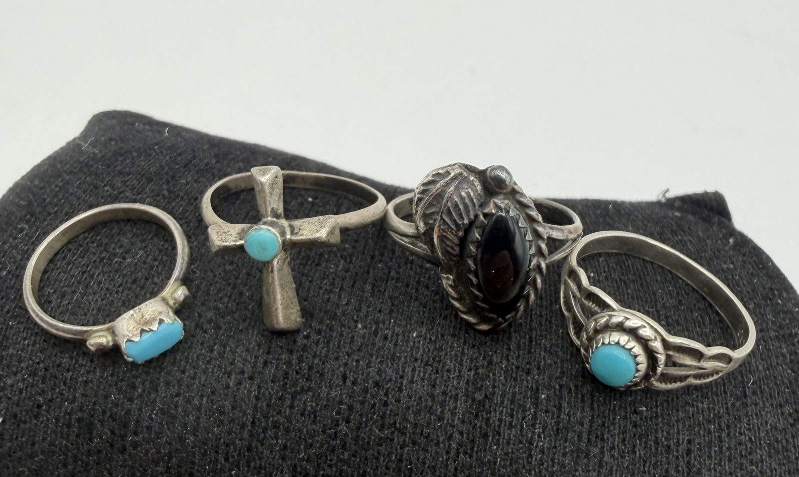 4 SMALL NATIVE AMERICAN STERLING TURQUOISE RINGS (1 of 4)