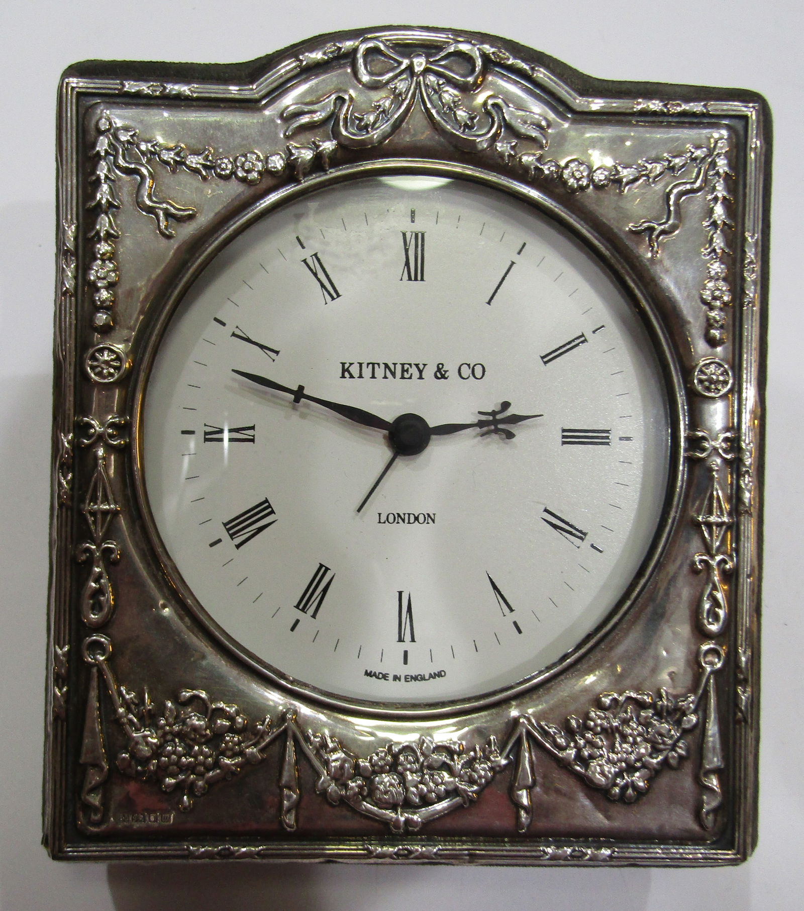 ENGLISH STERLING SILVER PICTURE FRAME KITNEY CLOCK: VINTAGE ESTATE HALLMARKED "GK&CK, LION,PANTHER &W". MEASURES 5 INCHES BY 6 INCHES. WEIGHS 249.1 GRAMS. CLOCK WORKS FINE, FRAME EXCELLENT USED CONDITION. WITH IMPERIAL AUCTION THE COST FOR