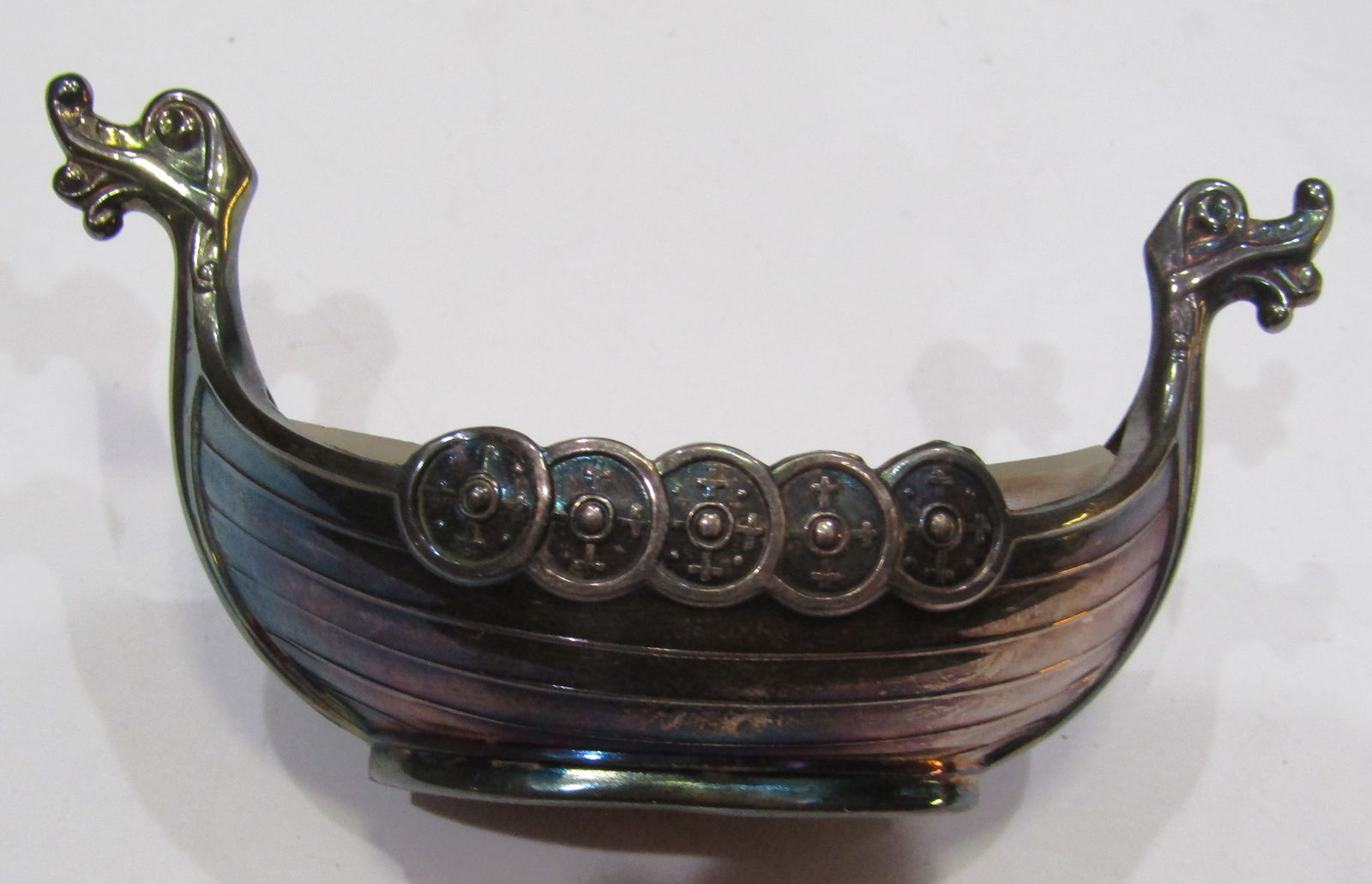 STERLING SILVER NORWAY VIKING SHIP VANITY OR SALT: THEODOR OLSEN MARKED "NORWAY STERLING 925". 3 DIMENSIONAL VIKING SHIP: ON A VANITY FOR JEWELRY, ON A TABLE FOR SALT, ON A DESK FOR PAPERCLIPS......MEASURES 3.25" BY 1.25". WEIGHS 31 GRAMS WITH