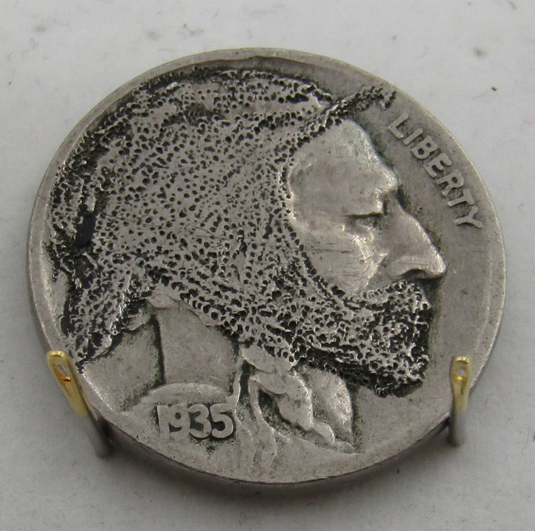 1935 HOBO NICKEL US 5 CENT COIN TRAMP ART: HAND CARVED 1935 HOBO NICKEL. WITH IMPERIAL AUCTION THE COST FOR PACKING AND SHIPPING VIA USPS IN THE USA IS $5.