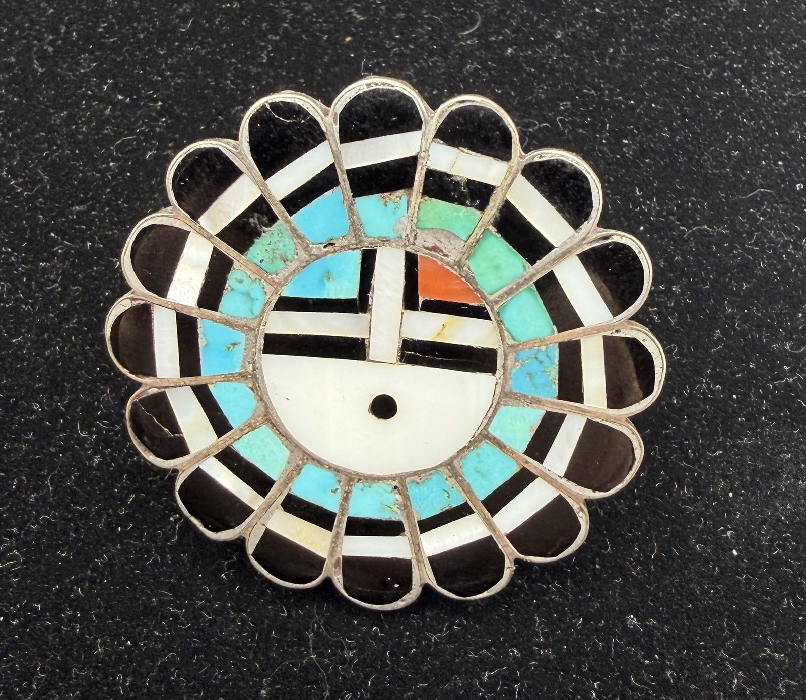 "KC" LARGE OLD PAWN ZUNI STERLING SUNFACE RING: VINTAGE ZUNI HANDMADE NATIVE AMERICAN KACHINA RING. GORGEOUS MULTICOLOR INLAID STONEWORK WITH TURQUOISE MOTHER OF PEARL SHELL RED CORAL AND ONYX. MARKED SIGNED "K-C" TESTED STERLING SILVER. WEIGHS 18