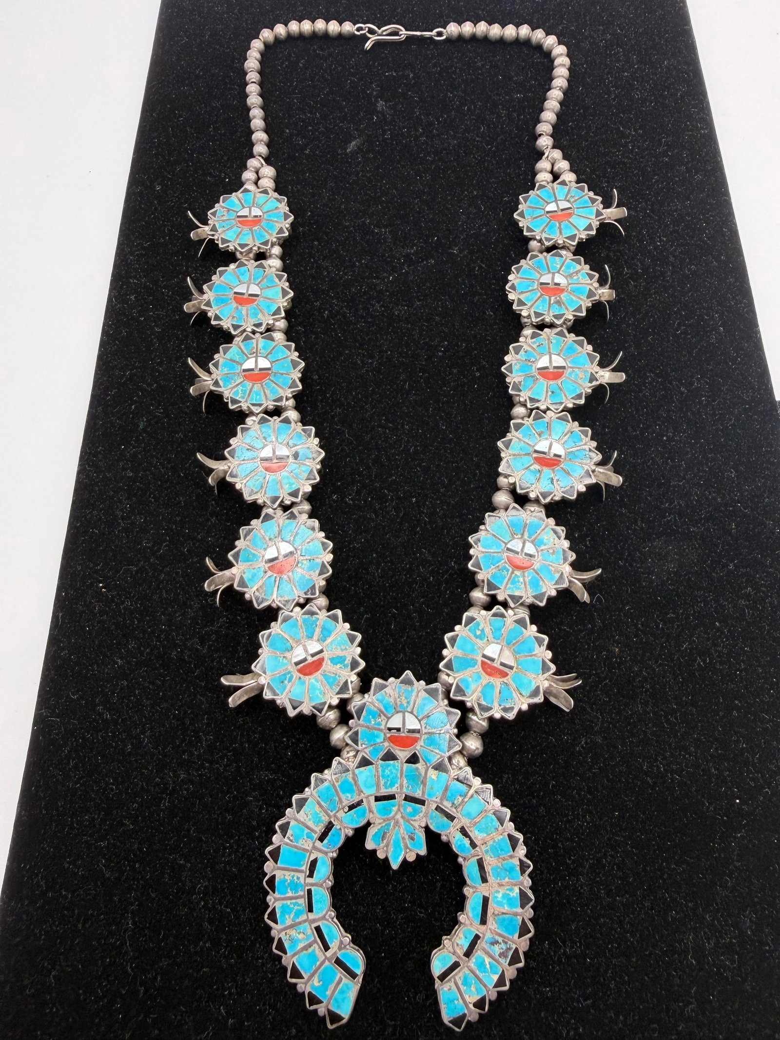 1960's SUNFACE SQUASH BLOSSOM NECKLACE STERLING: 1950's - 1960's OLD PAWN ZUNI HANDMADE NATIVE AMERICAN NECKLACE. GORGEOUS MULTICOLOR INLAID STONEWORK WITH TURQUOISE MOTHER OF PEARL SHELL RED CORAL AND ONYX. FLUSH INLAY DISHTA STYLE UNMARKED UNSIGNE