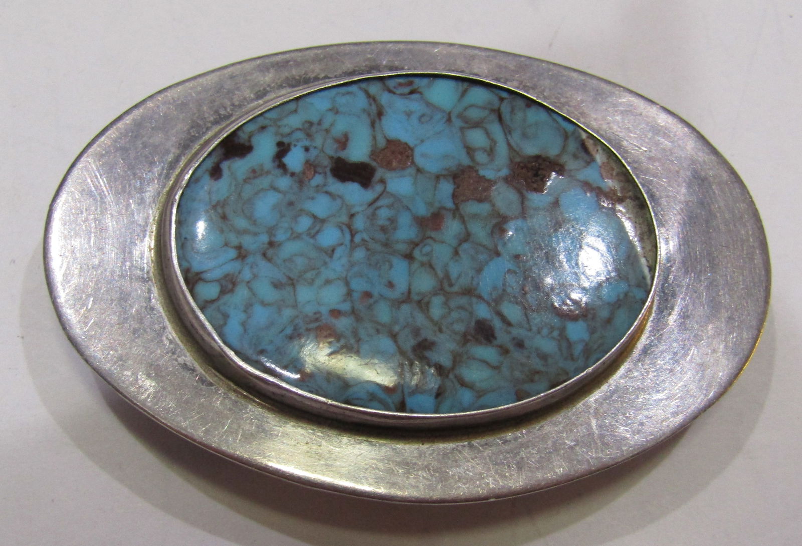 JES SPIDERWEB TURQUOISE BELT BUCKLE STERLING SILVE: VINTAGE ESTATE HANDMADE NATIVE AMERICAN SOUTHWEST NAVAJO INDIAN TURQUOISE BELT BUCKLE. MEASURES 2.5 INCHES BY 1.75 INCHES. WEIGHS 23.1 GRAMS. MARKED "JES" TESTED STERLING SILVER. EXCELLENT USED CONDIT