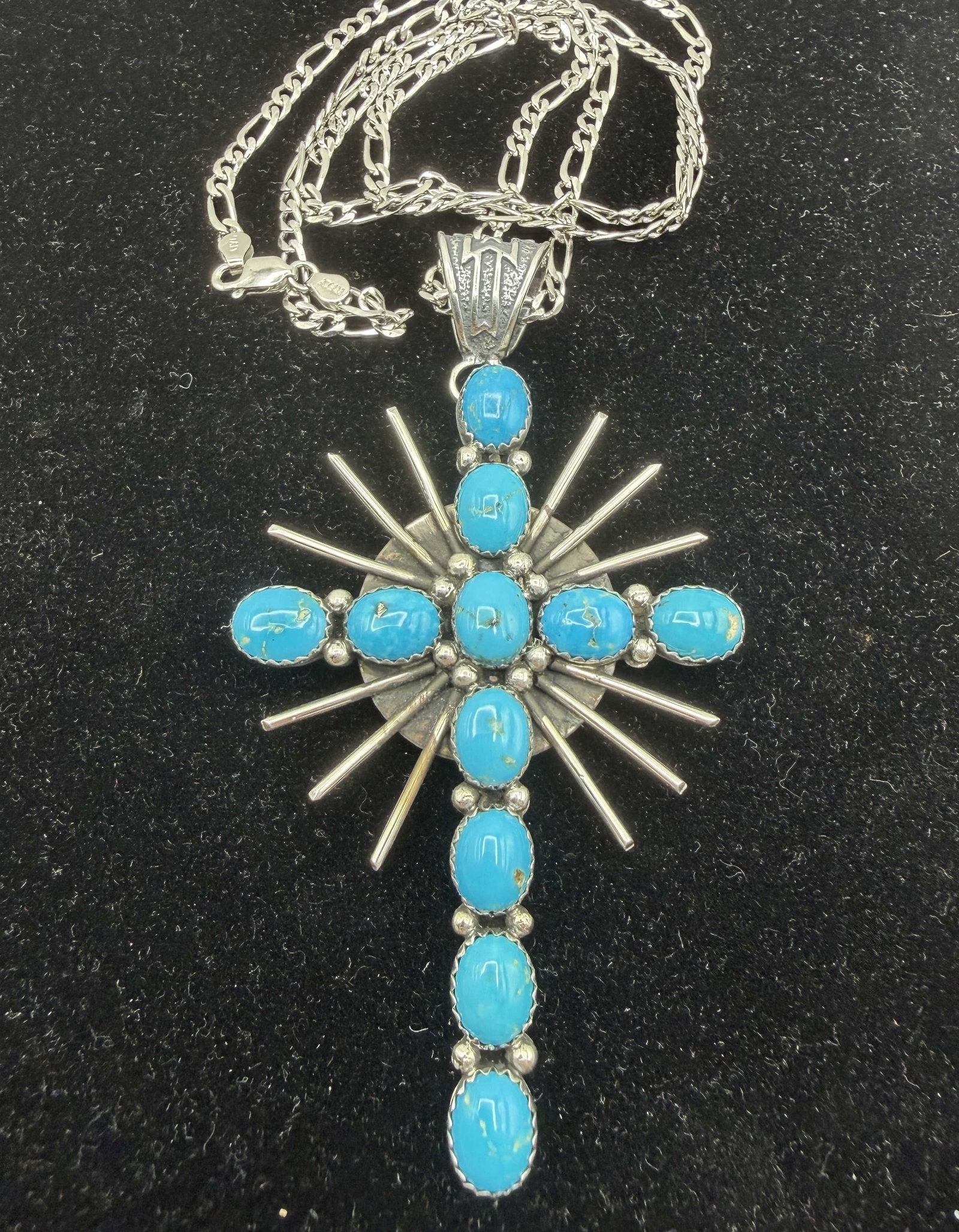 3.5" BLACKGOAT STERLING TURQUOISE CROSS NECKLACE: NATIVE AMERICAN NAVAJO NEW OLD STOCK HANDMADE CROSS PENDANT SIGNED VERNA BLACKGOAT. PENDANT IS 3.5" X 2". FIGARO CHAIN IS 24". ALL TESTED STERLING SILVER. WEIGHS 34 GRAMS TOTAL. WITH IMPERIAL AUCTION 