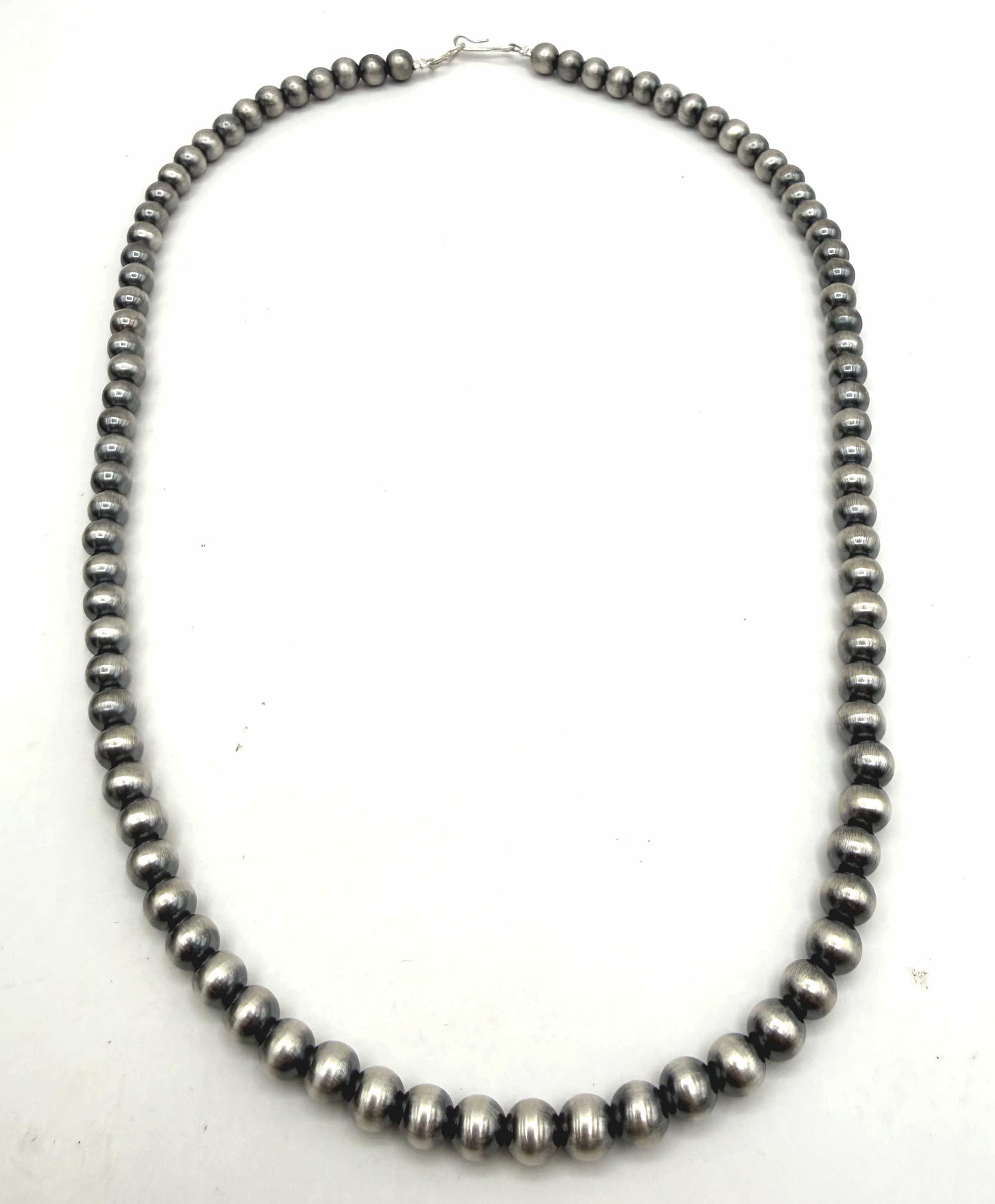 LOUISE JOE NAVAJO PEARLS STERLING NECKLACE: NEW OLD STOCK NATIVE AMERICAN HANDMADE NECKLACE. ANODIZED NAVAJO PEARL BEADS. TESTED STERLING SILVER. WEIGHS 20 GRAMS. MEASURES 20" AND BEADS ARE 6MM. WITH IMPERIAL AUCTION THE COST FOR PACKING AND