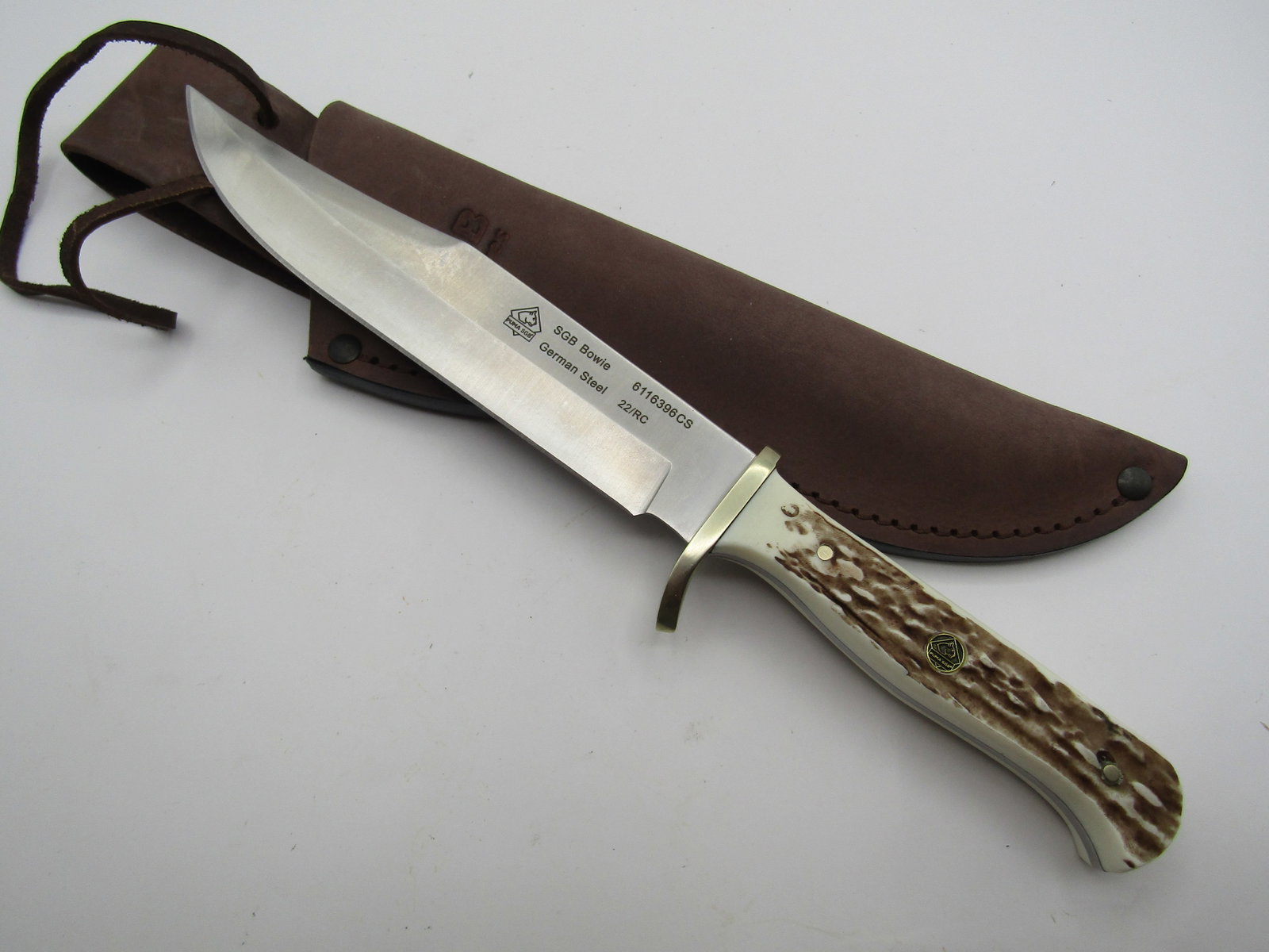 PUMA BOWIE HUNTING KNIFE: LARGE BOWIE KNIFE BY PUMA . 11 INCH WITH 6 1/2 INCH BLADE. MICARTA STAG GRIP. LIKE NEW WITH BOX. WITH IMPERIAL AUCTION THE COST FOR PACKING AND SHIPPING VIA USPS IN THE USA IS $5.