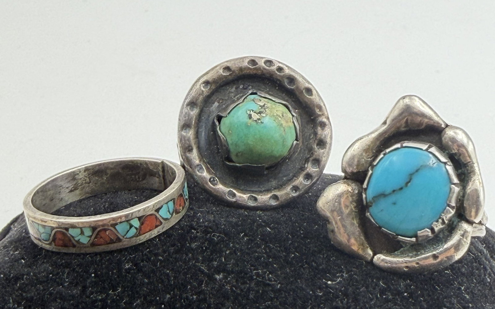 LOT OF 3 STERLING NATIVE AMERICAN TURQUOISE RINGS: VINTAGE HANDMADE RINGS ALL TESTED STERLING SILVER. GORGEOUS TURQUOISE STONES. ONE IS RED CORAL AND TURQUOISE CHIP ETERNITY BAND. RING SIZES 6, 6.5, AND 8. TOTAL WEIGHT 13.4 GRAMS. USA SHIPPING $5.