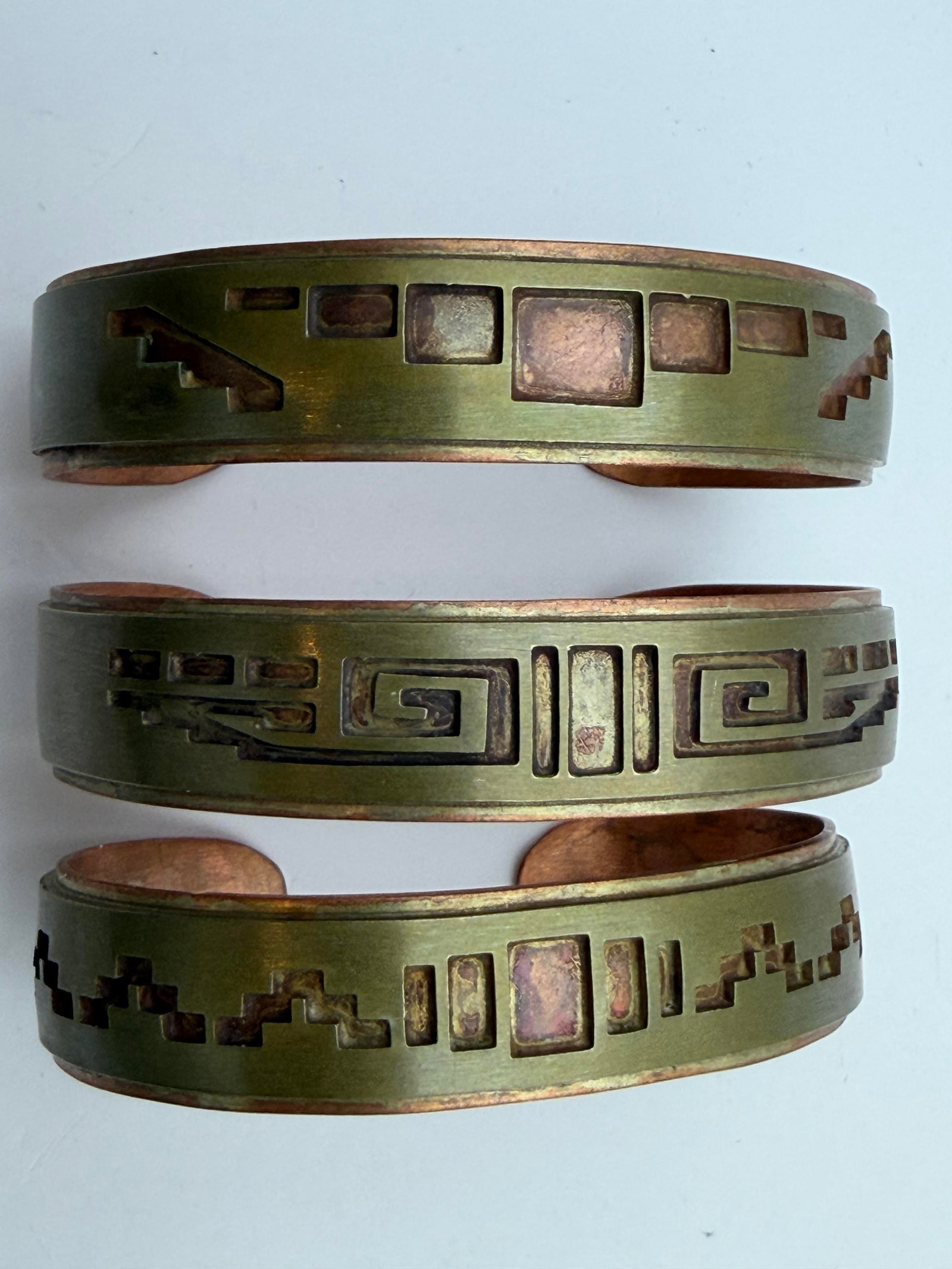 UNIQUE LOT OF 3 COPPER BRASS STORYTELLER BRACELETS: NEW OLD STOCK HANDMADE CUFF BRACELETS. WEIGHS 117 GRAMS TOTAL. ALL HAVE 1.25" GAP FLEXIBLE AND FIT 7.5" WRIST. WITH IMPERIAL AUCTION THE COST FOR PACKING AND SHIPPING VIA USPS IN THE USA IS $5.