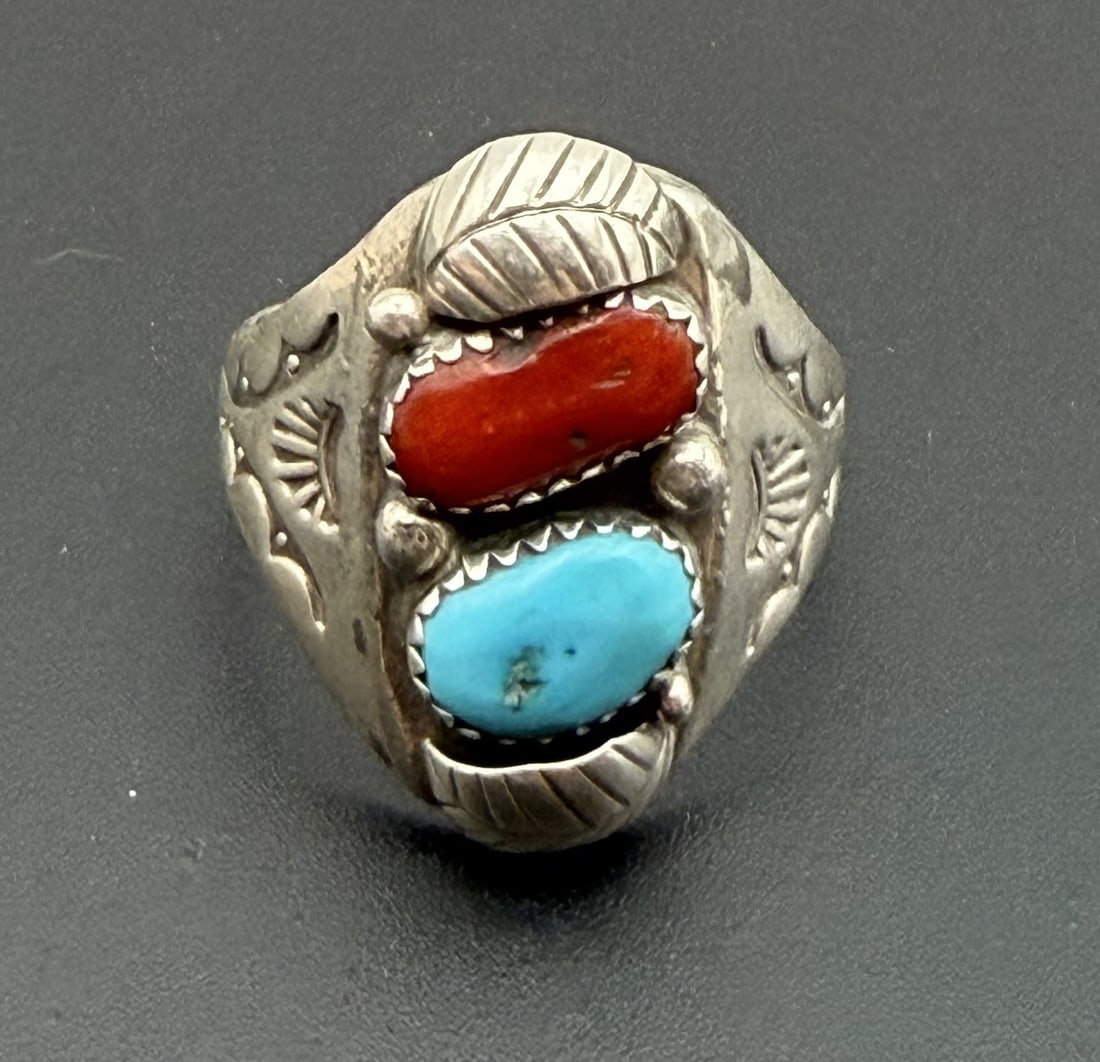 SIZE 14 STERLING SILVER TURQUOISE RED CORAL RING: LARGE SIZE NATIVE AMERICAN HANDMADE RING. UNSIGNED MARKED TESTED STERLING SILVER. FACE OF RING IS 1-1/8" NORTH SOUTH. WEIGHS 10.9 GRAMS. RING SIZE 14. WITH IMPERIAL AUCTION THE COST FOR PACKING AND SH