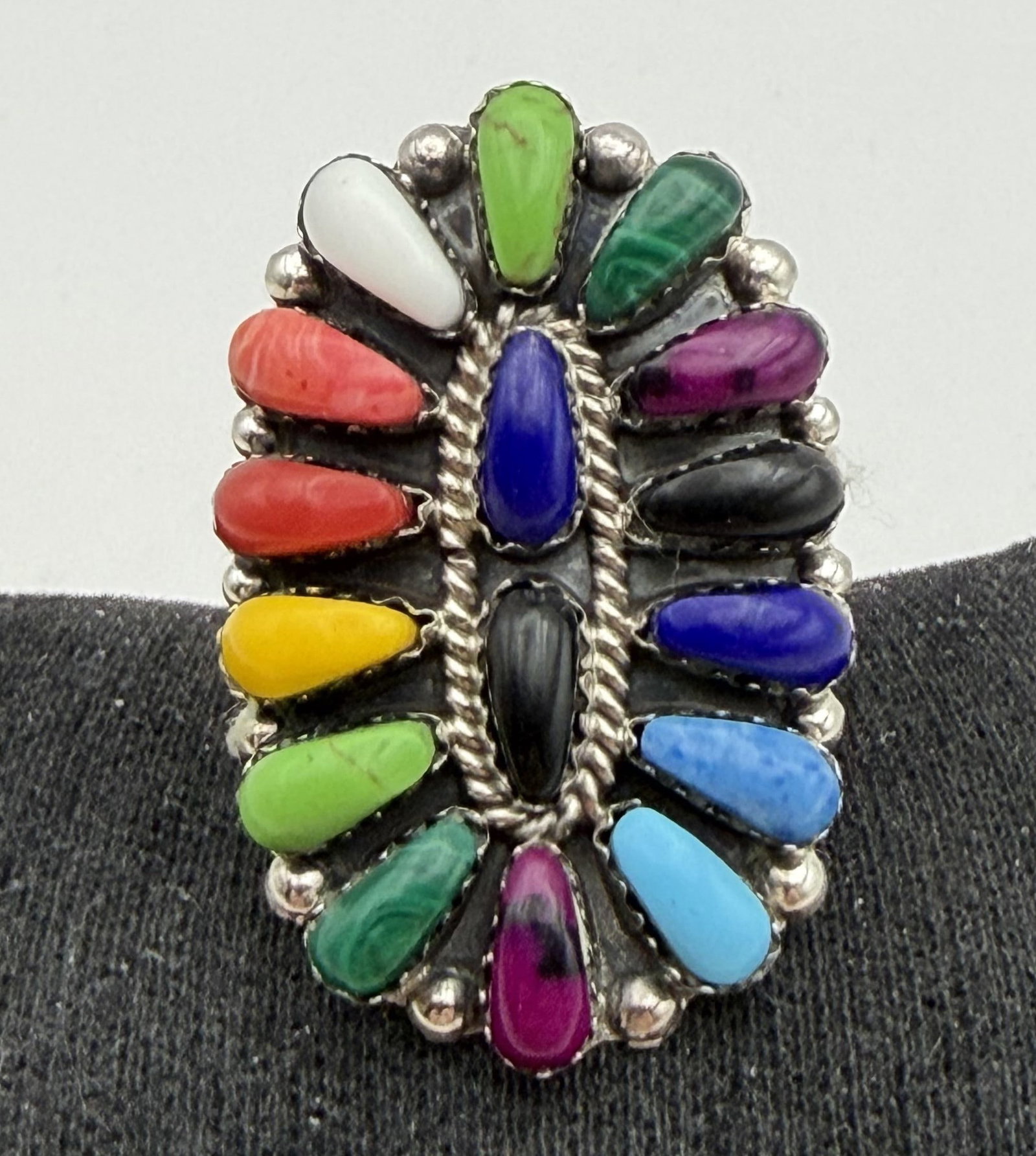 ROSANA WILLIAMS STERLING TURQUOISE CLUSTER RING: NEW OLD STOCK NATIVE AMERICAN NAVAJO HANDMADE MULTICOLOR RAINBOW CLUSTER RING. SIGNED "RW". TESTED STERLING SILVER. FACE OF RING IS JUST UNDER 1.5". RING SIZE 9. WEIGHS 7 GRAMS. WITH IMPERIAL AUCTION 