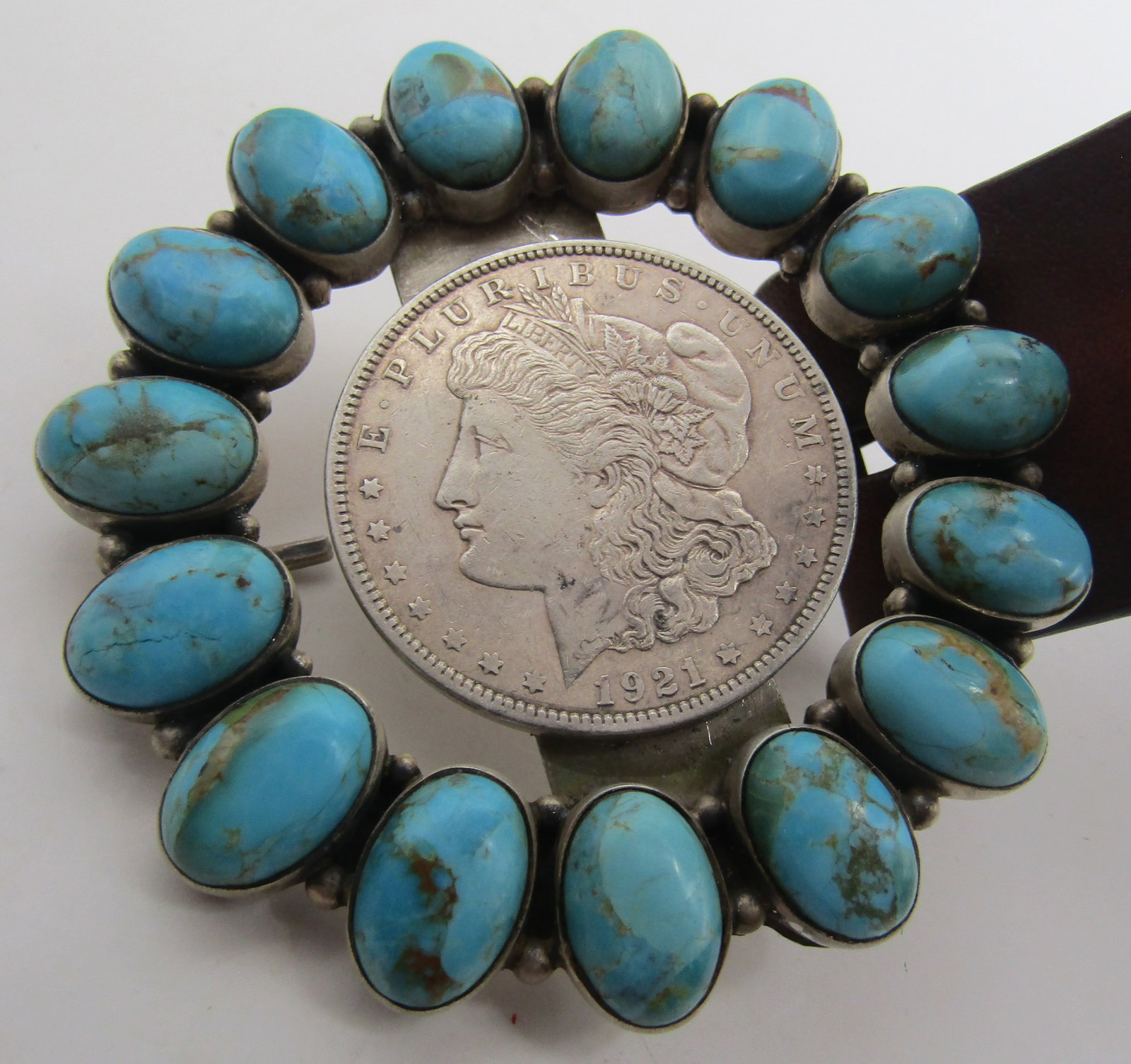 1921 SILVER DOLLAR TURQUOISE STERLING BUCKLE &BELT: SHOW STOPPER GENUINE 1921 US SILVER DOLLAR COIN, STERLING & TURQUOISE BUCKLE ARTIST HALLMARKED "HD STERLING" NATIVE AMERICAN SOUTHWEST NAVAJO INDIAN JEWELRY. LEEGIN LEATHER STAMPED DESIGN BELT MEASURE