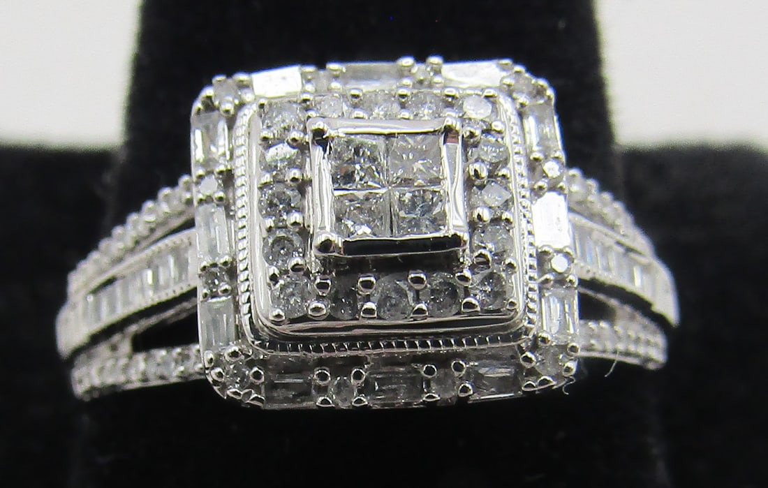 90 NATURAL DIAMOND RING 10K WHITE GOLD SIZE 7: 90 GENUINE NATURAL DIAMONDS. MOUNTED IN 10K WHITE GOLD MOUNTING. SIZE 7. WEIGHS 2.4 GRAMS, EXCELLENT, NEW CONDITION. WITH IMPERIAL AUCTION THE COST FOR PACKING AND SHIPPING VIA USPS IN THE USA IS $5.