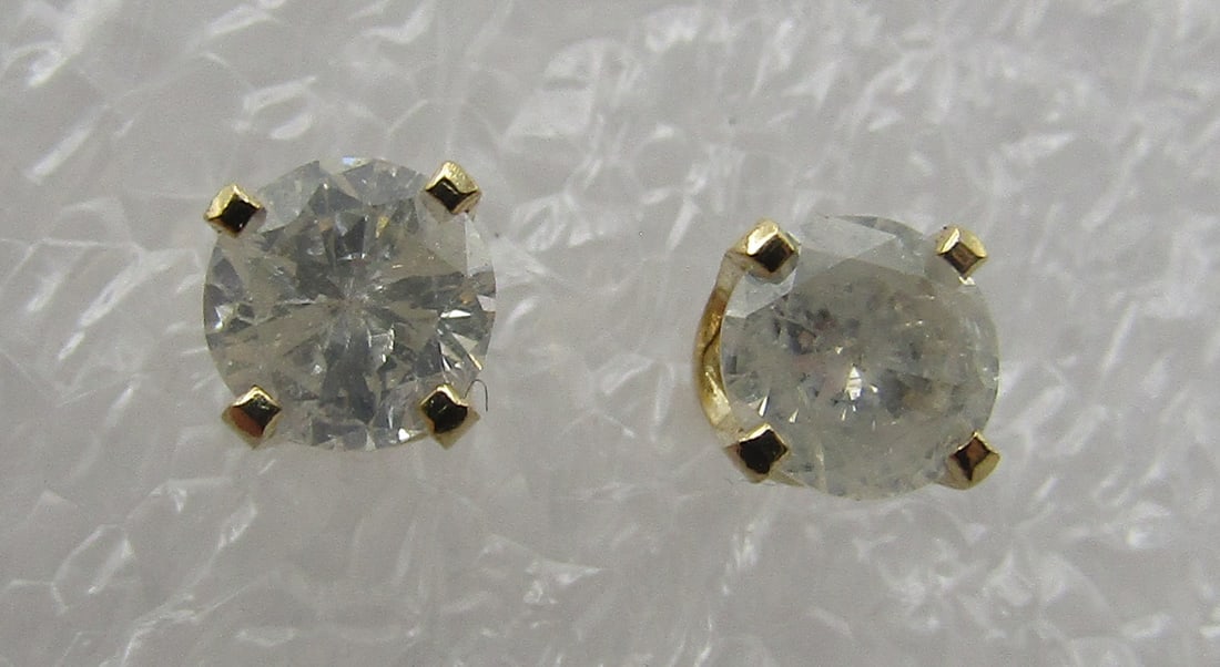 .50CT DIAMOND STUD EARRINGS 14K YELLOW GOLD: 14K YELLOW GOLD 1/2 CARAT DIAMOND STUD EARRINGS. WEIGH 1.0 GRAM. EXCELLENT, NEW CONDITION. WITH IMPERIAL AUCTION THE COST FOR PACKING AND SHIPPING VIA USPS IN THE USA IS $5.