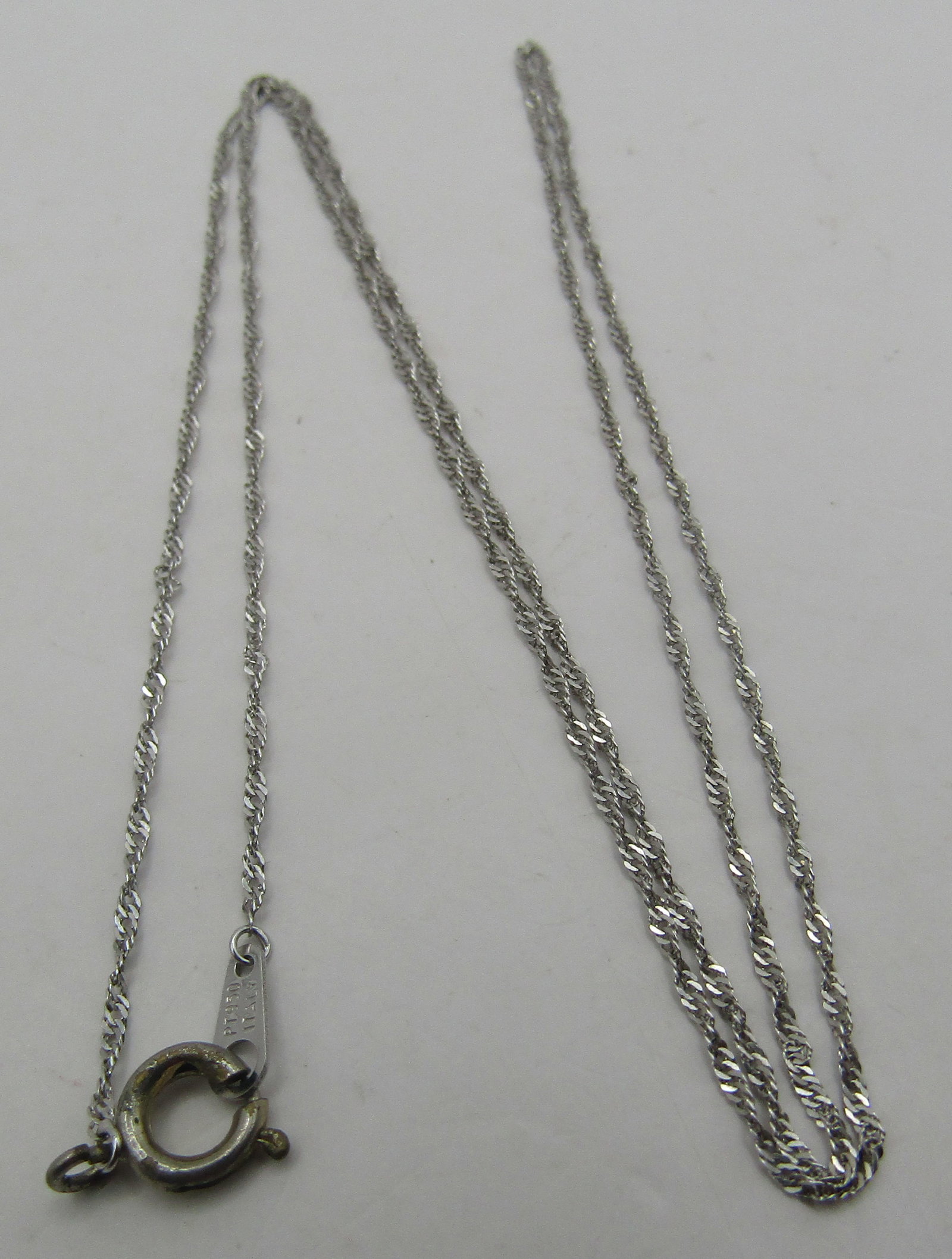 18" PLATINUM LINK CHAIN NECKLACE 1.6GRAM: GENUINE VINTAGE ESTATE MARKED "PT 950 ITALY" PLATINUM. MEASURES 18"LONG. WEIGHS1.6 GRAMS. EXCELLENT CONDITION. WITH IMPERIAL AUCTION THE COST FOR PACKING AND SHIPPING VIA USPS IN THE USA IS $5.
