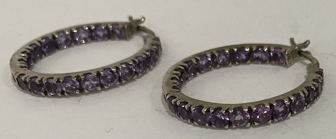 GSJ AMETHYST HOOP EARRINGS STERLING SILVER QVC: SIGNED "GSJ" 1 INCH IN AND OUT AMETHYST, STERLING SILVER EARRINGS WEIGH 6.9 GRAMS. EXCELLENT CONDITION. WITH IMPERIAL AUCTION THE COST FOR PACKING AND SHIPPING VIA USPS IN THE USA IS $5.