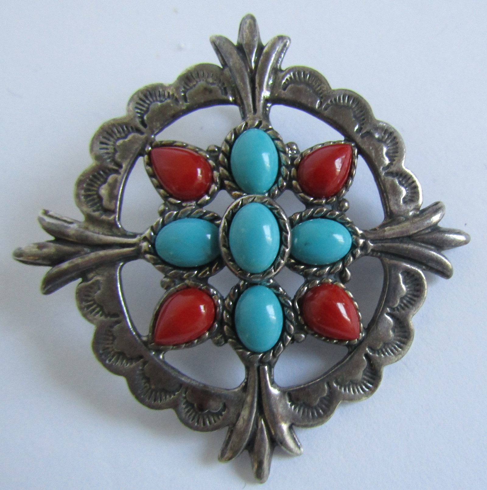 "QT" TURQUOISE CORAL NECKLACE PENDANT STERLING 15G: PENDANT MEASURES 2 INCHES LONG BY 2 INCHES WIDE. MARKED "QT 925", WEIGHS 15.2 GRAMS. EXCELLENT CONDITION. WITH IMPERIAL AUCTION THE COST FOR PACKING AND SHIPPING VIA USPS IN THE USA IS $5.