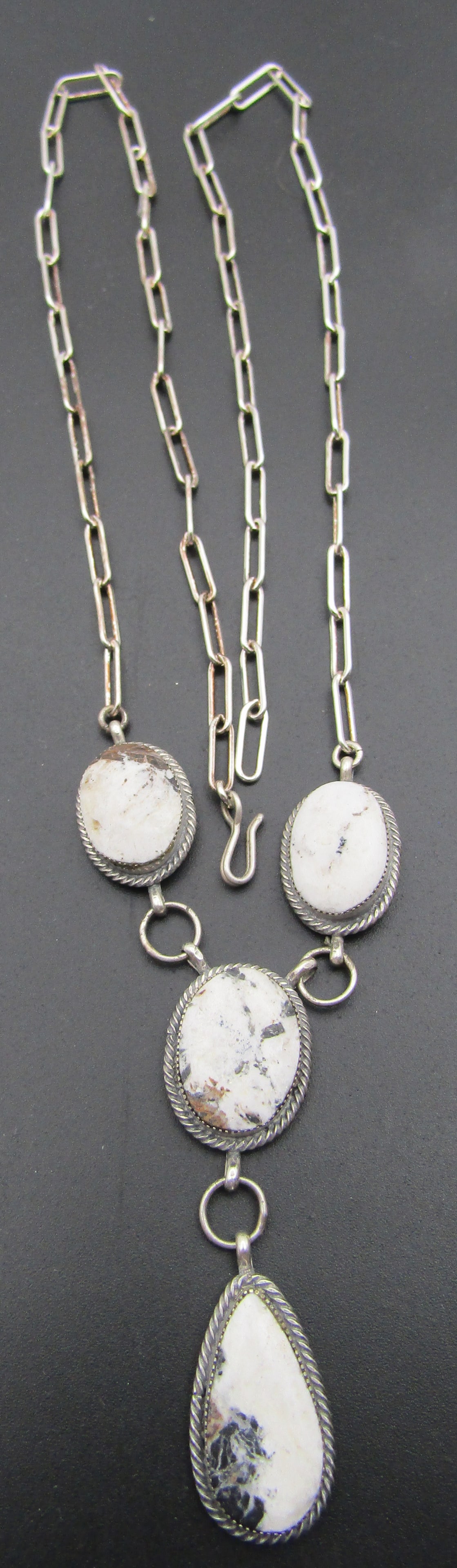 27"RB" WHITE BUFFALO NECKLACE STERLING SILVER: HALLMARKED "RB" NECKLACE WITH 6 PIECES GENUINE GEM TURQUOISE. NATIVE AMERICAN SOUTHWEST NAVAJO INDIAN JEWELRY. MEASURES 27 INCH LONG PLUS A 2.5/8 INCH DROP. TESTED STERLING SILVER. WEIGHS 33.4GRAMS. E